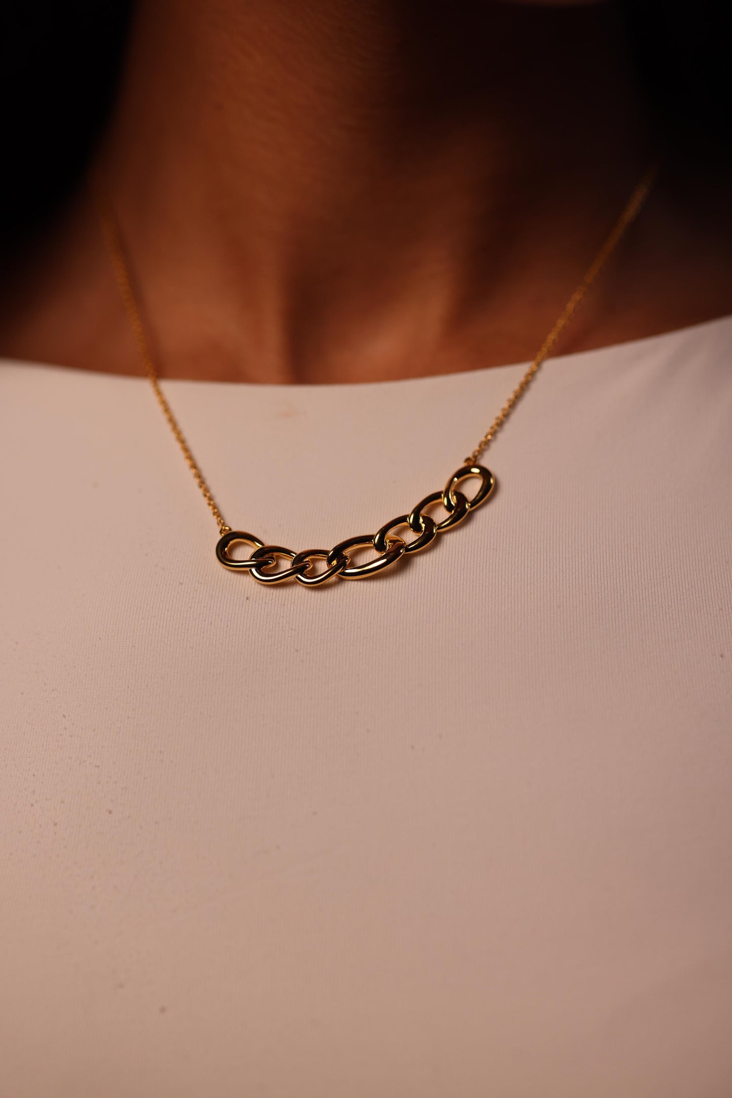 Gaath Necklace elegant linked design resting naturally along the neckline