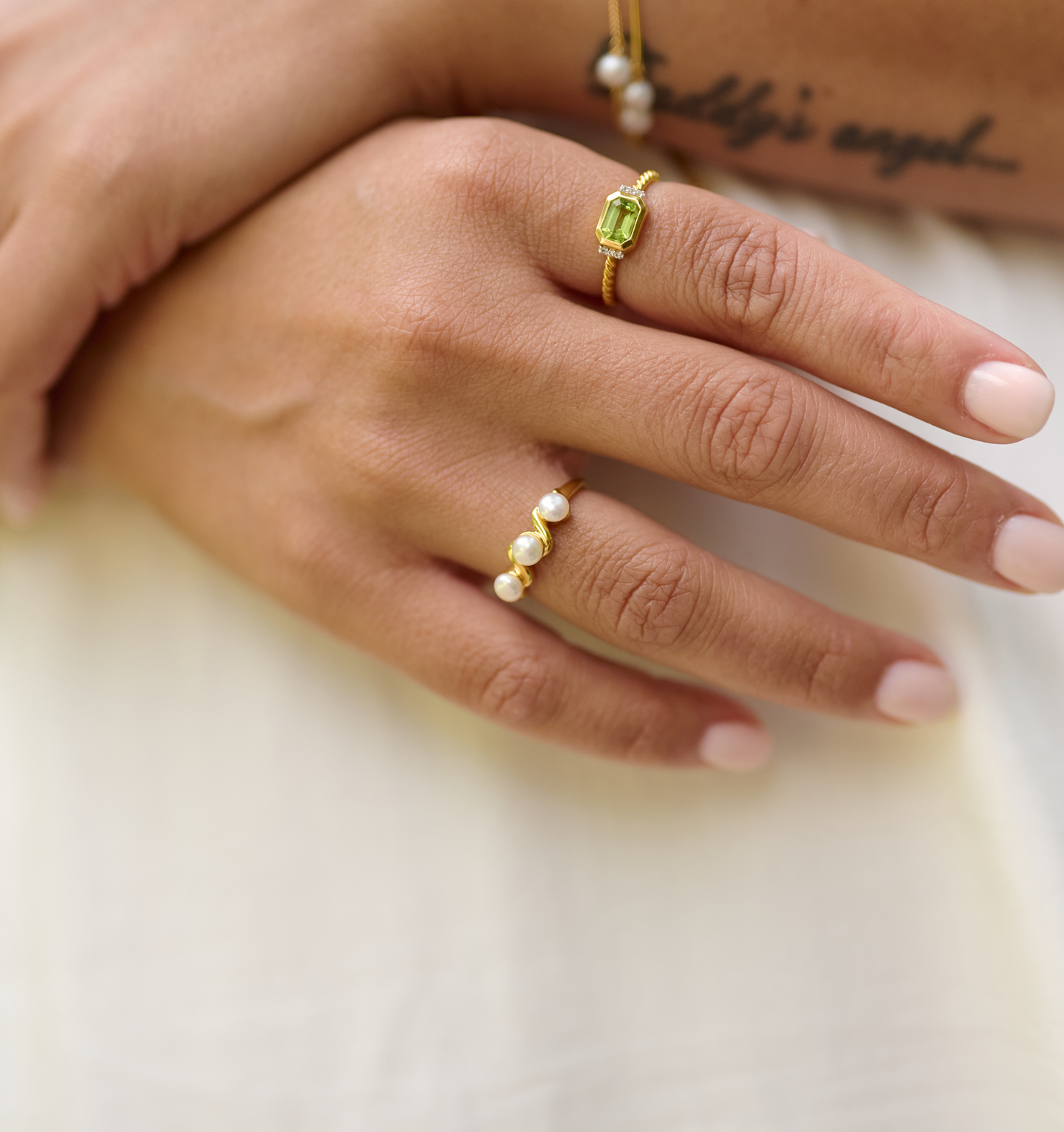Tirya Ring with three pearls in a golden curve on hand, elegant feminine jewelry