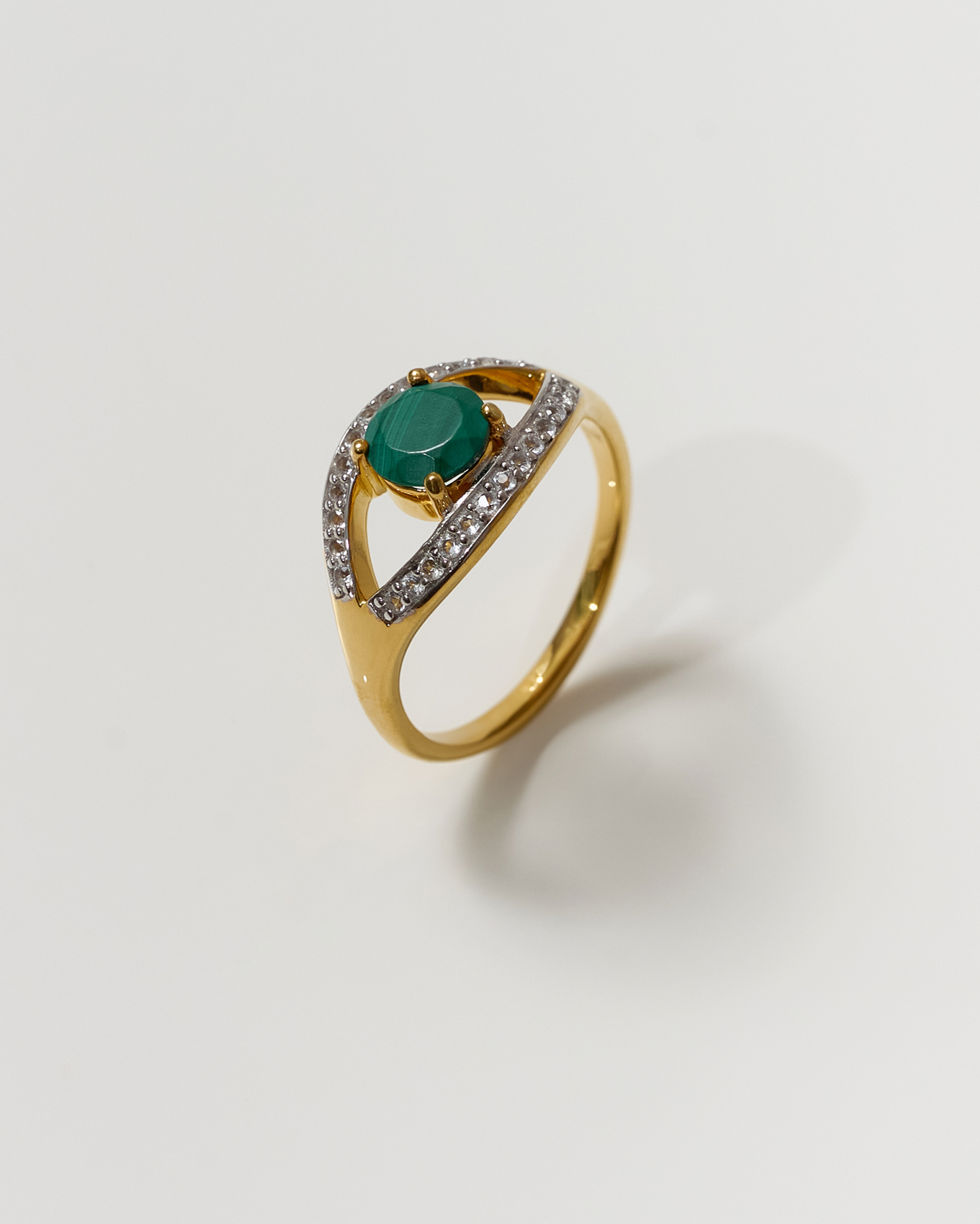 Saena Ring gold with green gemstone and diamond accents, symbolizing protection and intuition