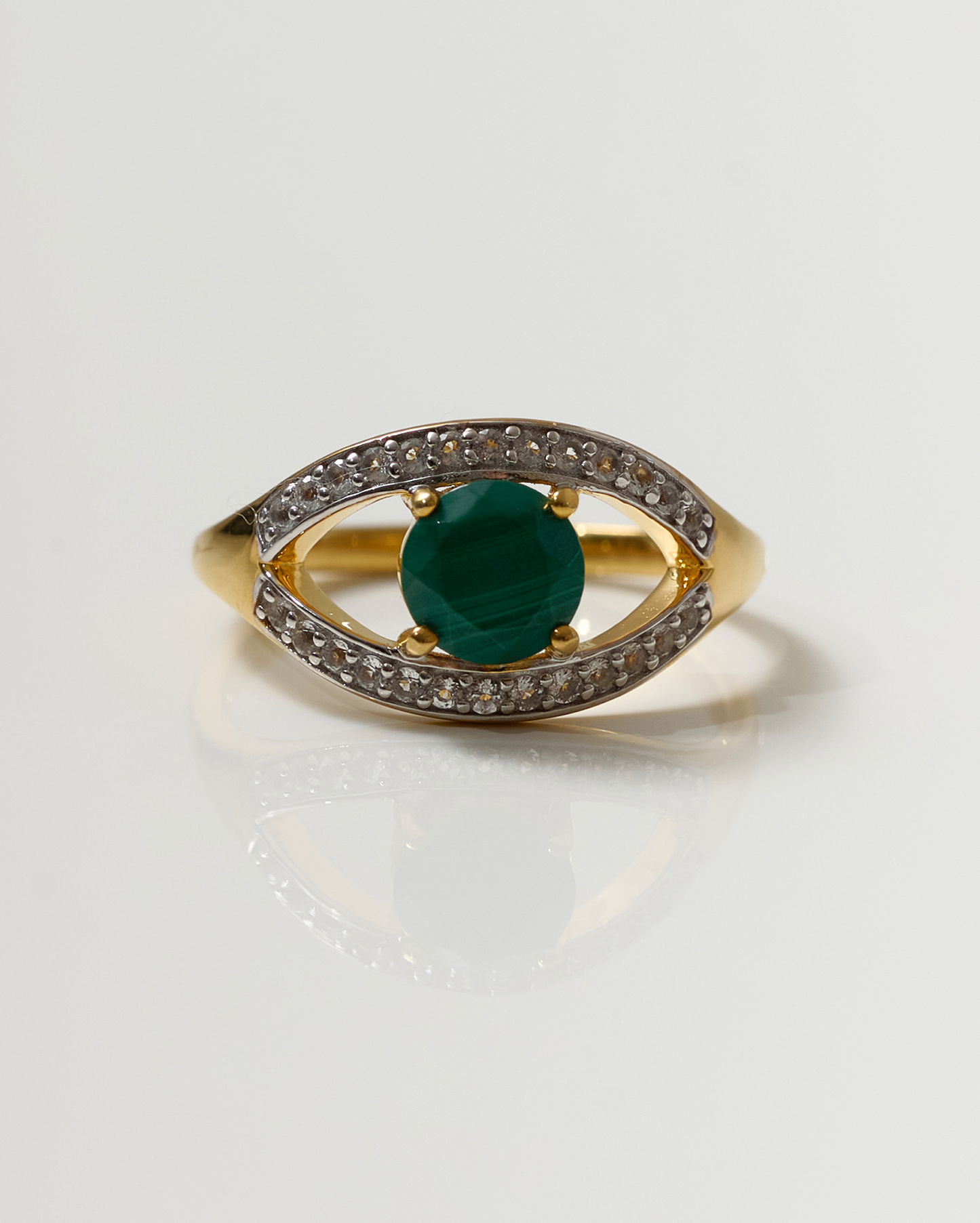Saena Ring with green gemstone and diamond-studded gold eye-shaped design