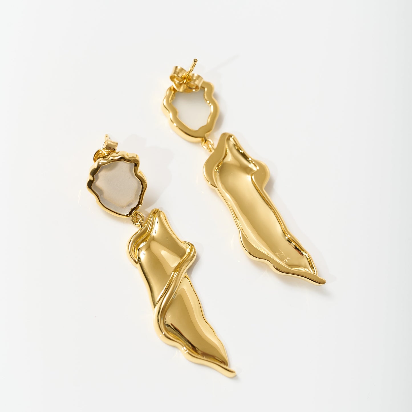 Elegant gold Thalena Earrings with sculpted design and moonstone accents
