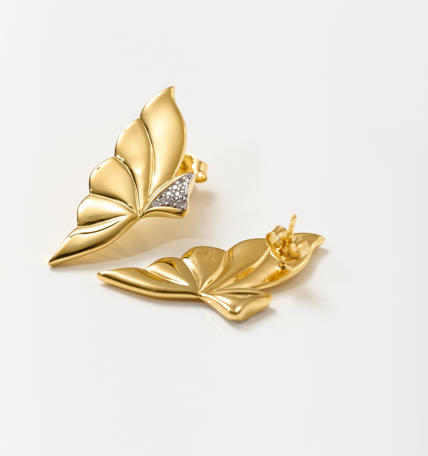 Elara Earrings gold butterfly wing inspired stud earrings with small diamond detail