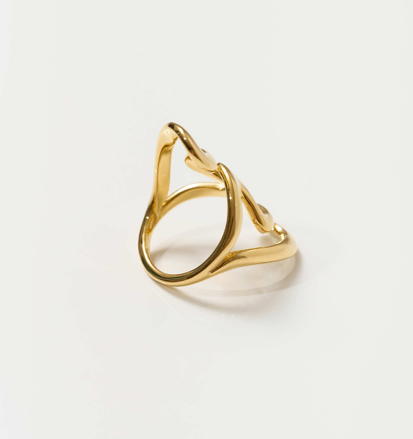 Samvaar Ring in radiant gold with two intertwined fluid hearts symbolizing unity and eternal love