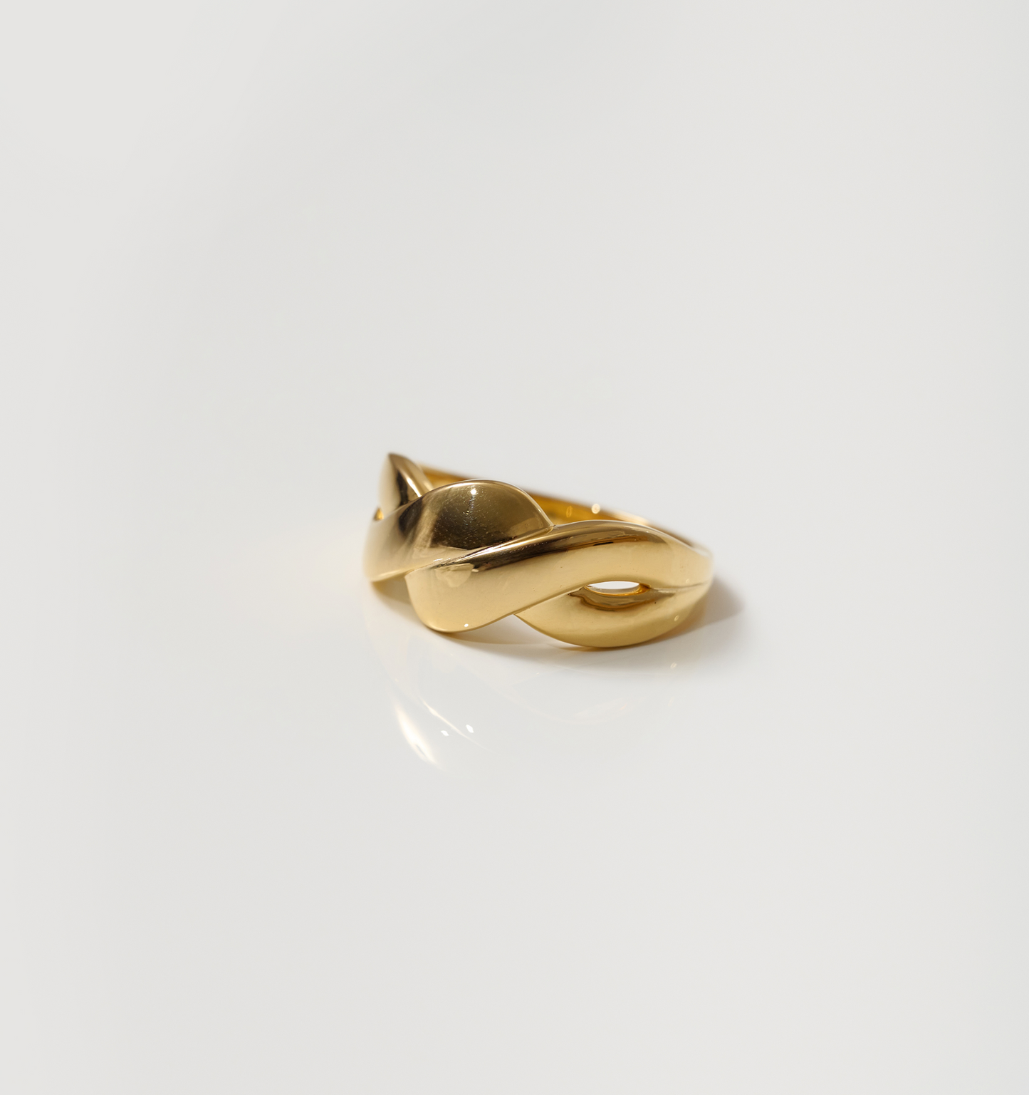 Gold Niva Ring with smooth, fluid design reflecting eternal presence