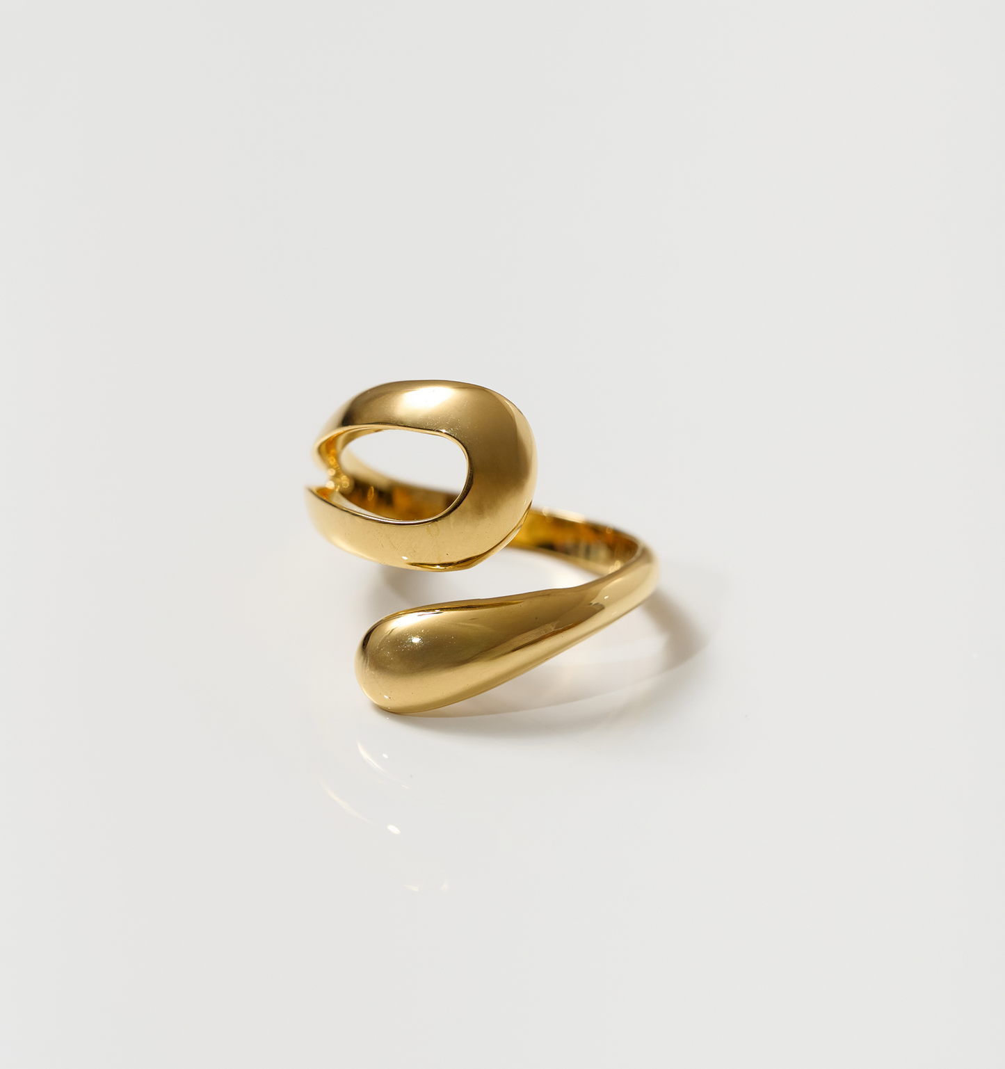 Elegant gold Oriya Ring with a smooth spiral design for women