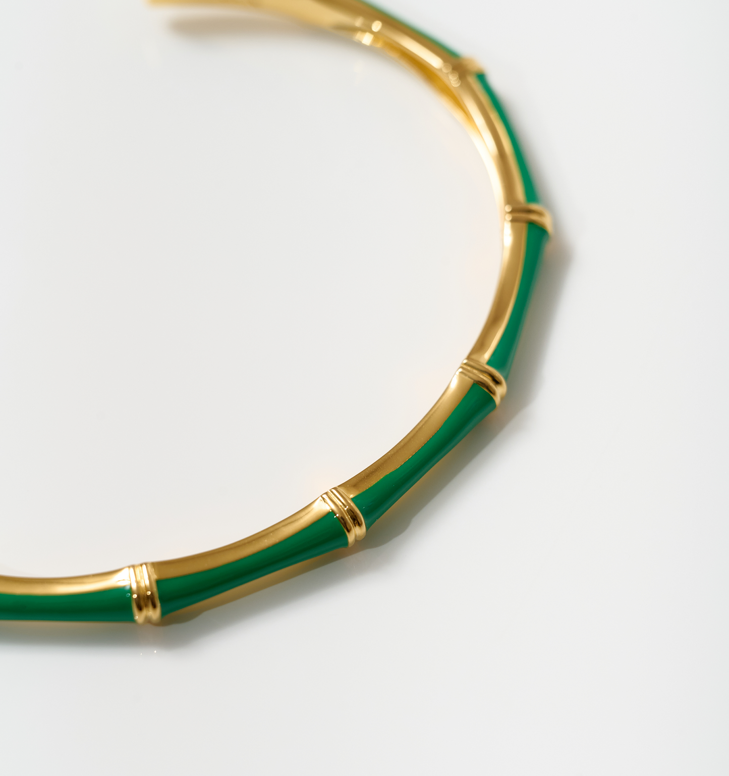 Baana Cuff bamboo-inspired gold and green enamel bracelet segment detail