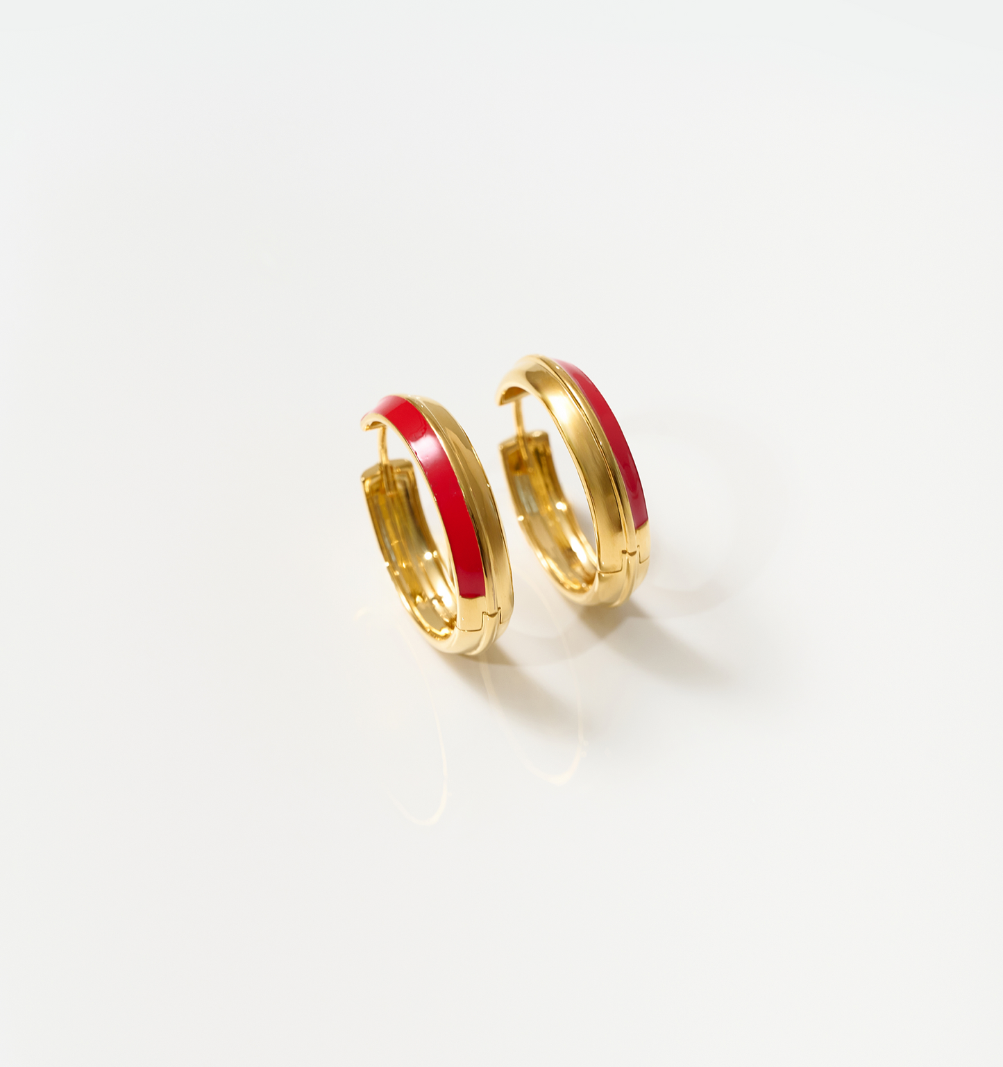 Gold hoop earrings with deep red enamel detailing, Rati Hoop design