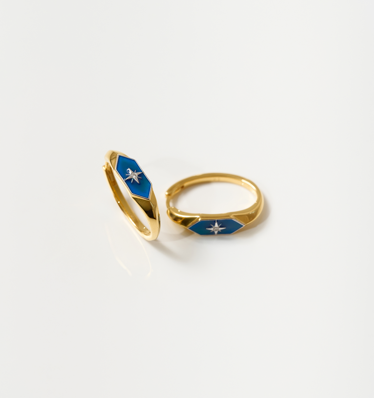 Gold Lumira Hoops with blue enamel and star design