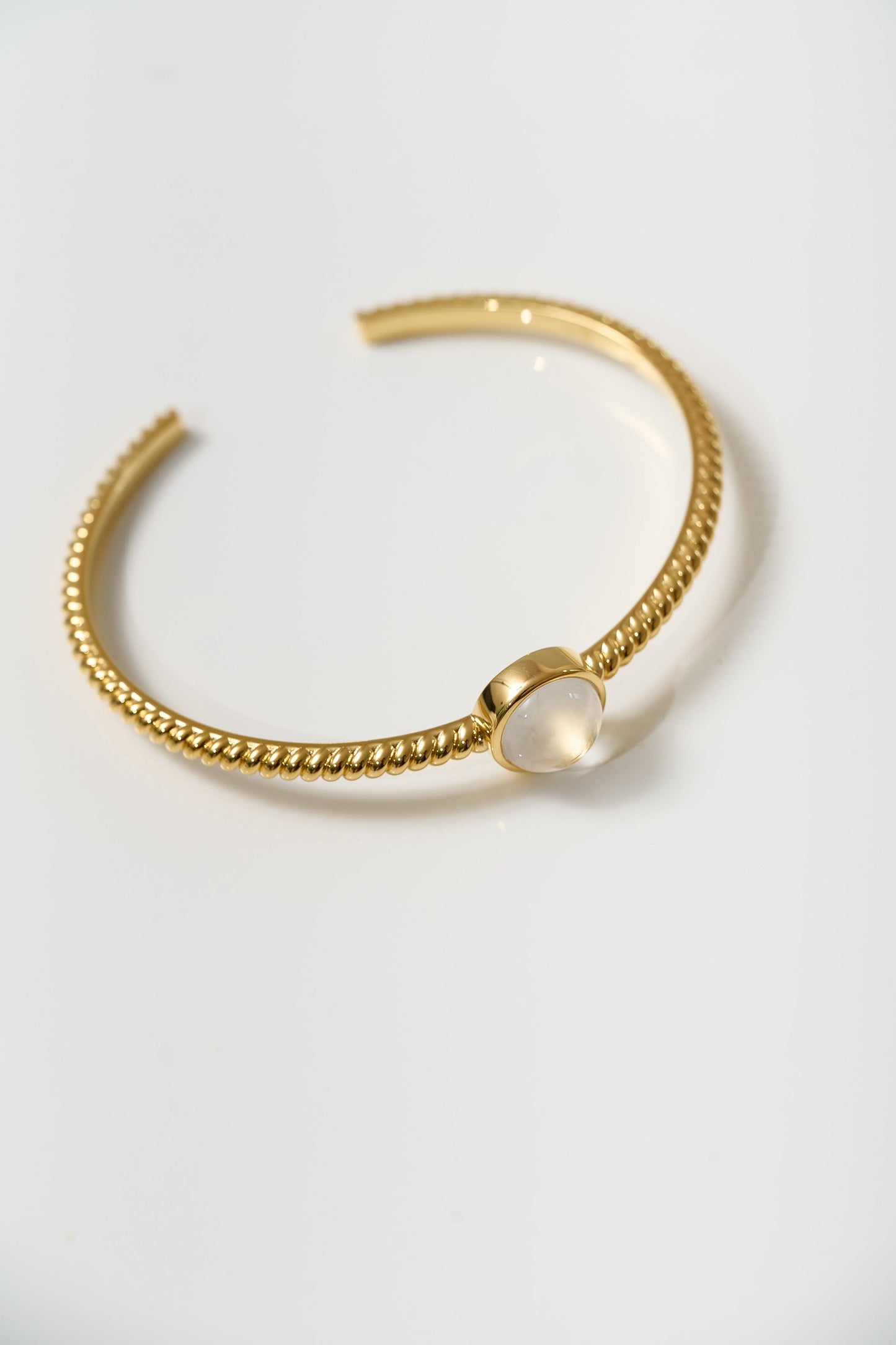 Gold Tarini Cuff with moonstone talisman for balance and intuition