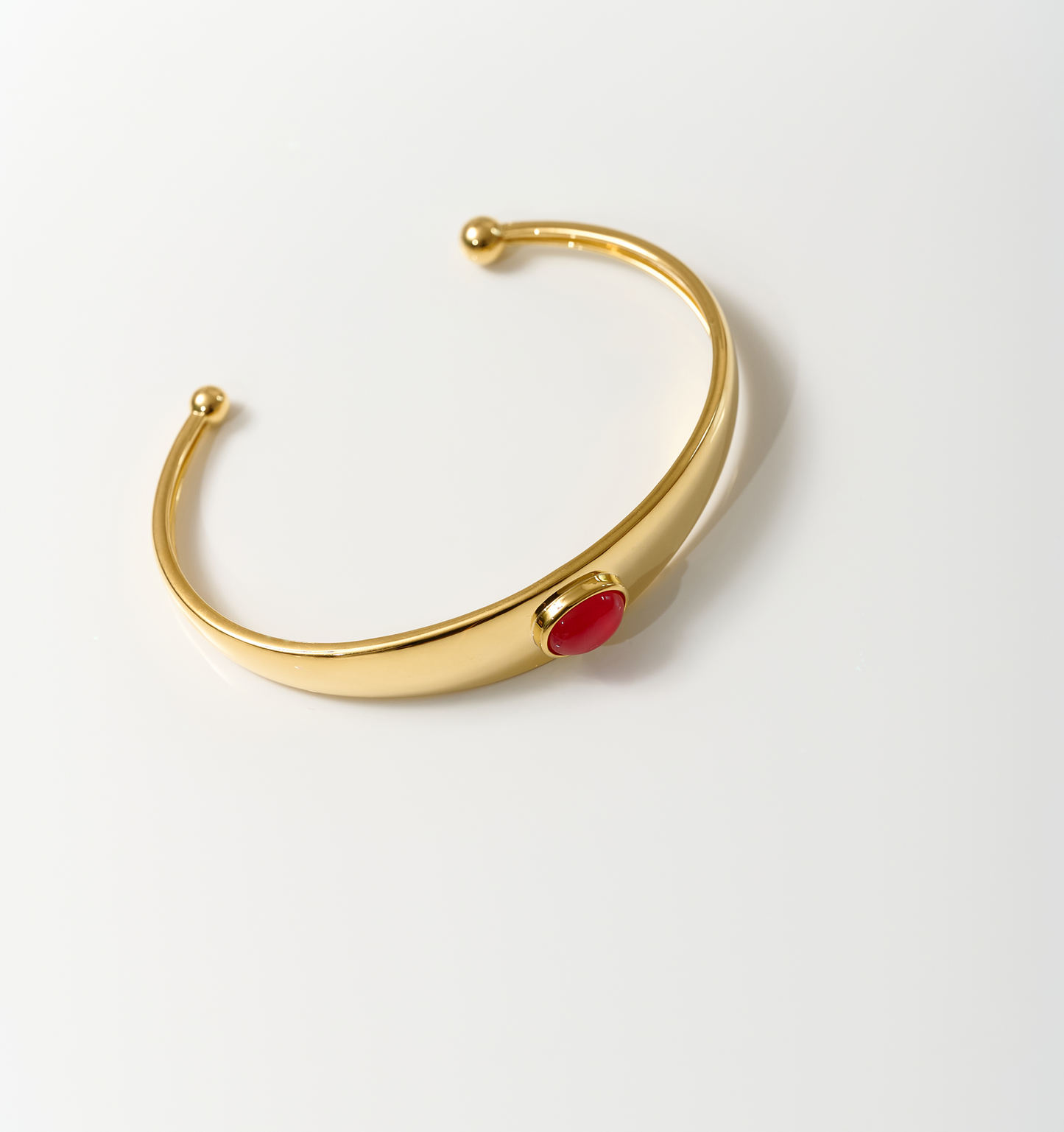 Dhruva Cuff gold bracelet with red onyx stone for grounded courage and clarity