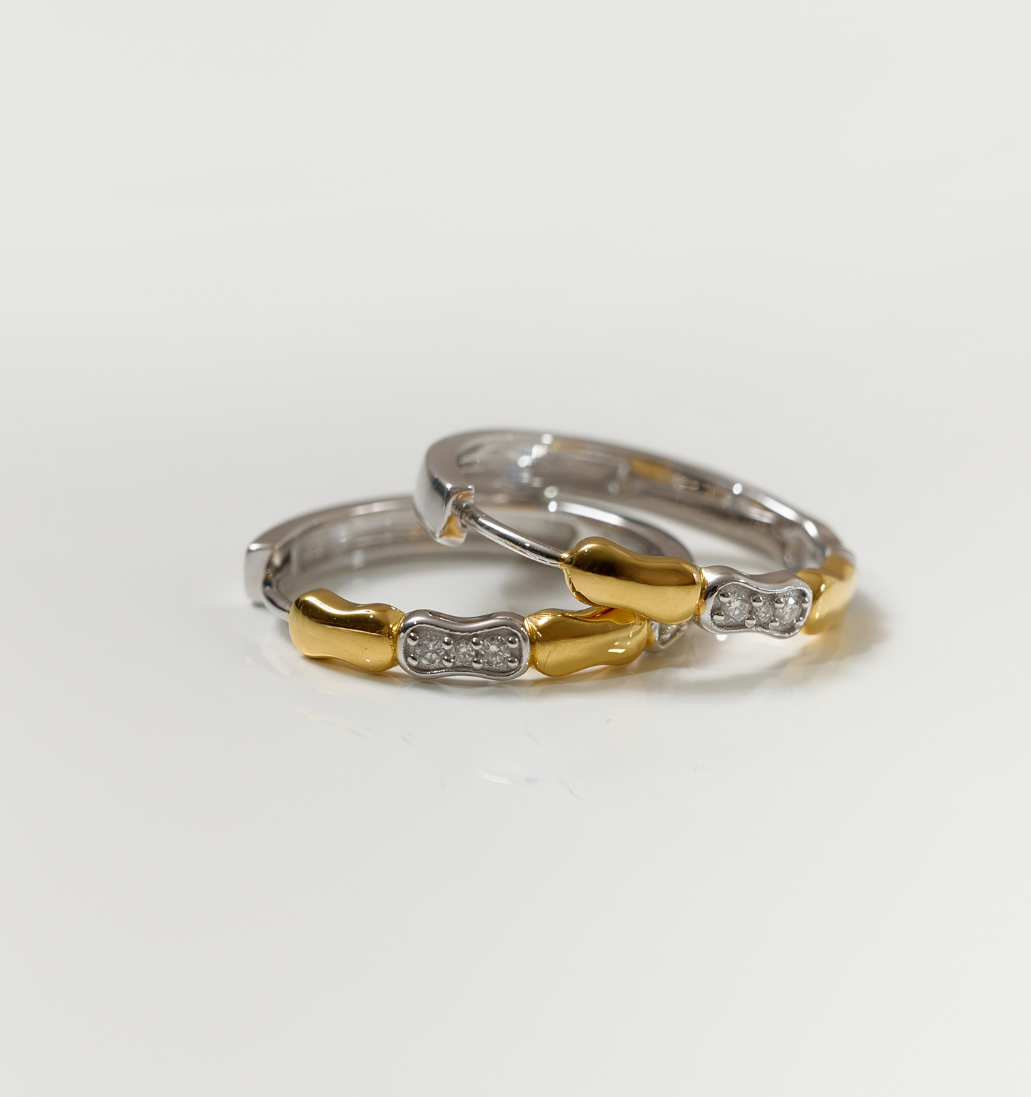 Orita Earrings gold and silver hoop earrings with sparkling stones