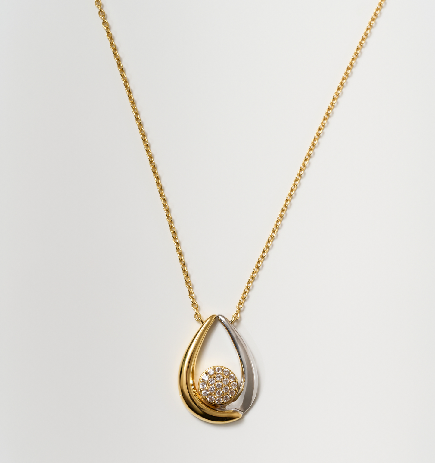 Antara Necklace with gold and silver arcs and 19 white topaz cluster pendant on gold chain