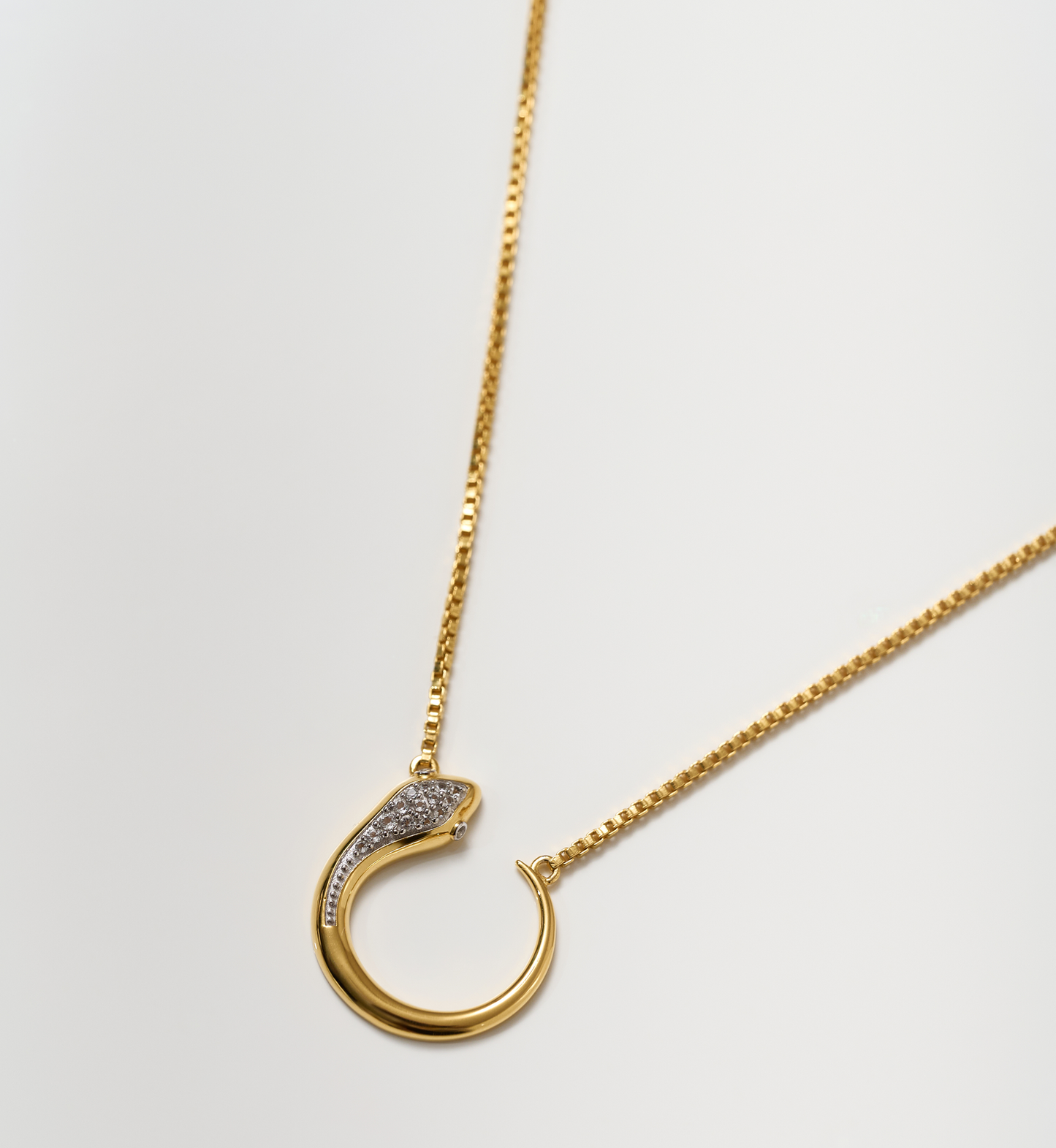 Oroha Necklace gold serpent pendant with white topaz on delicate chain