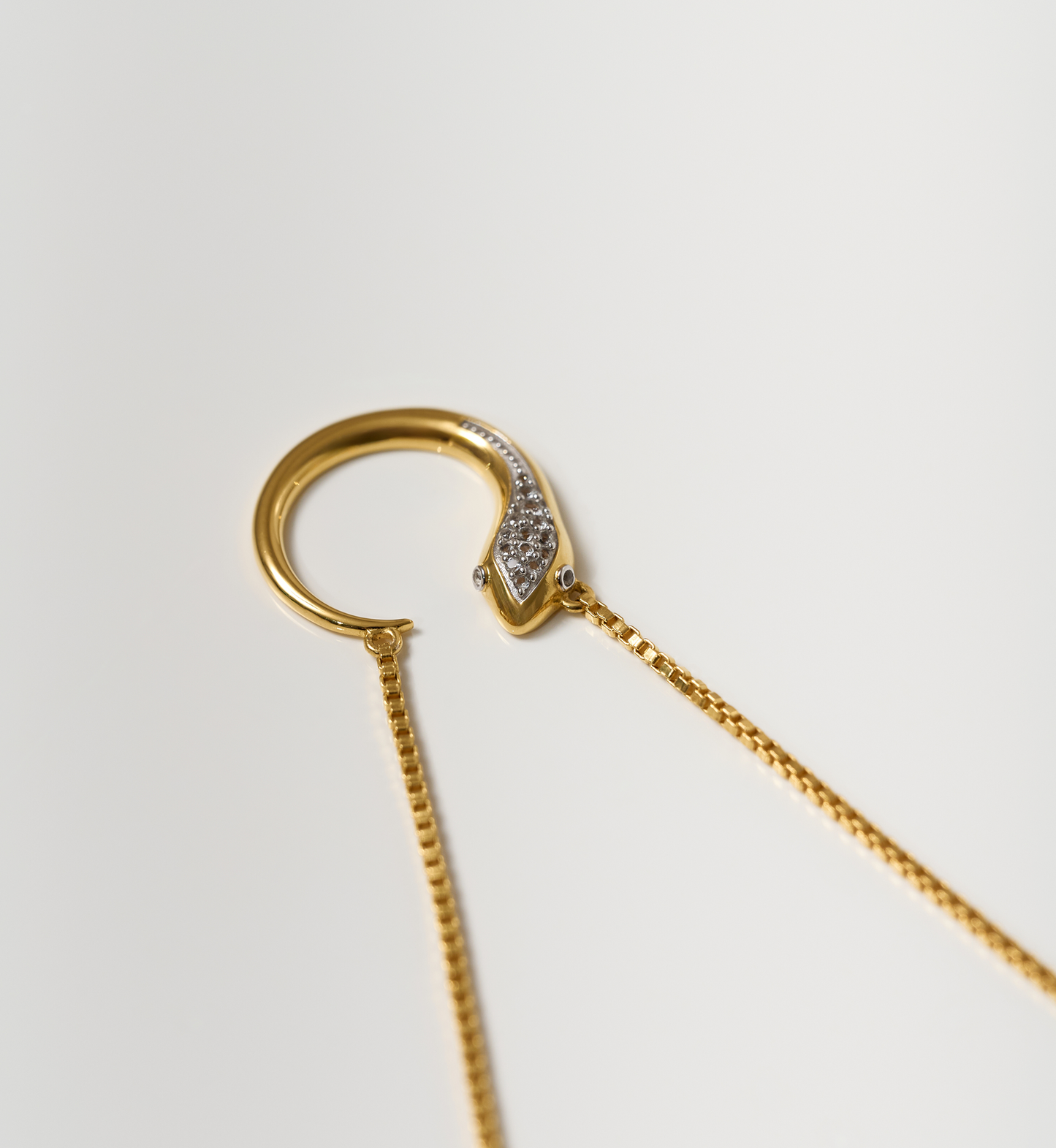 Oroha Necklace gold serpent pendant with white topaz on delicate chain