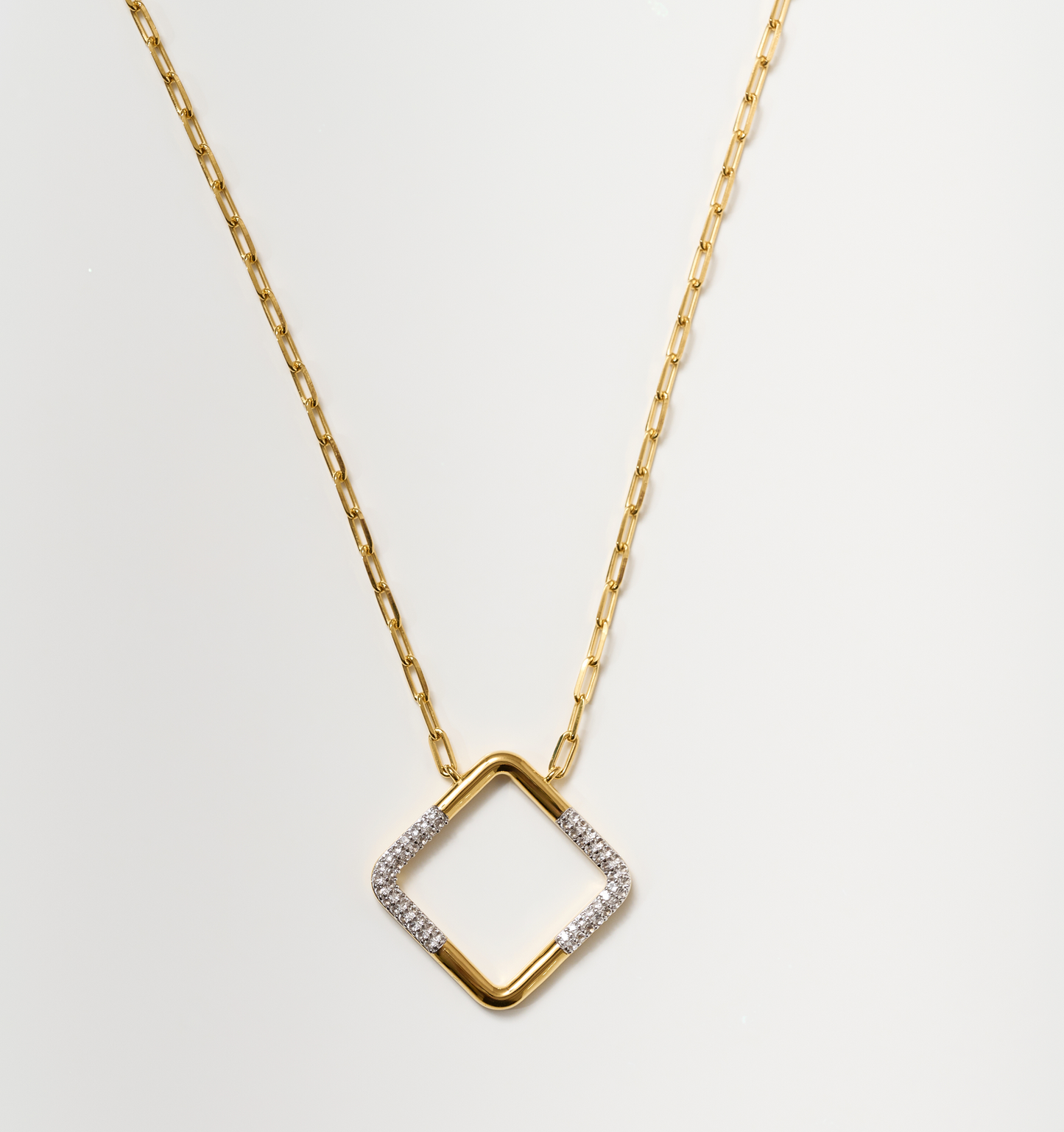Trayi Necklace gold chain with diamond-studded square pendant and white topaz accents