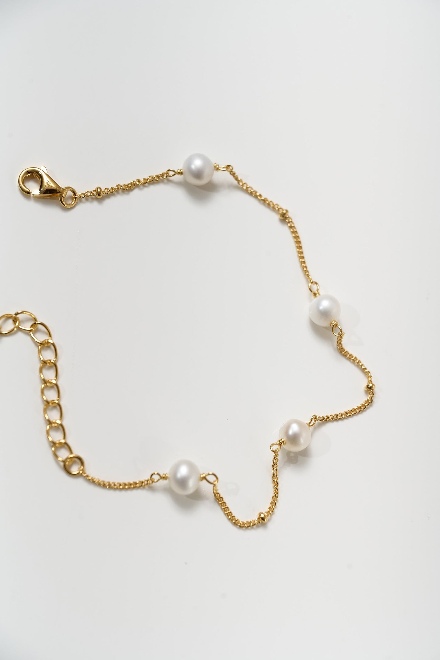 Shanai Bracelet with six pearls on delicate gold chain for a graceful, peaceful look