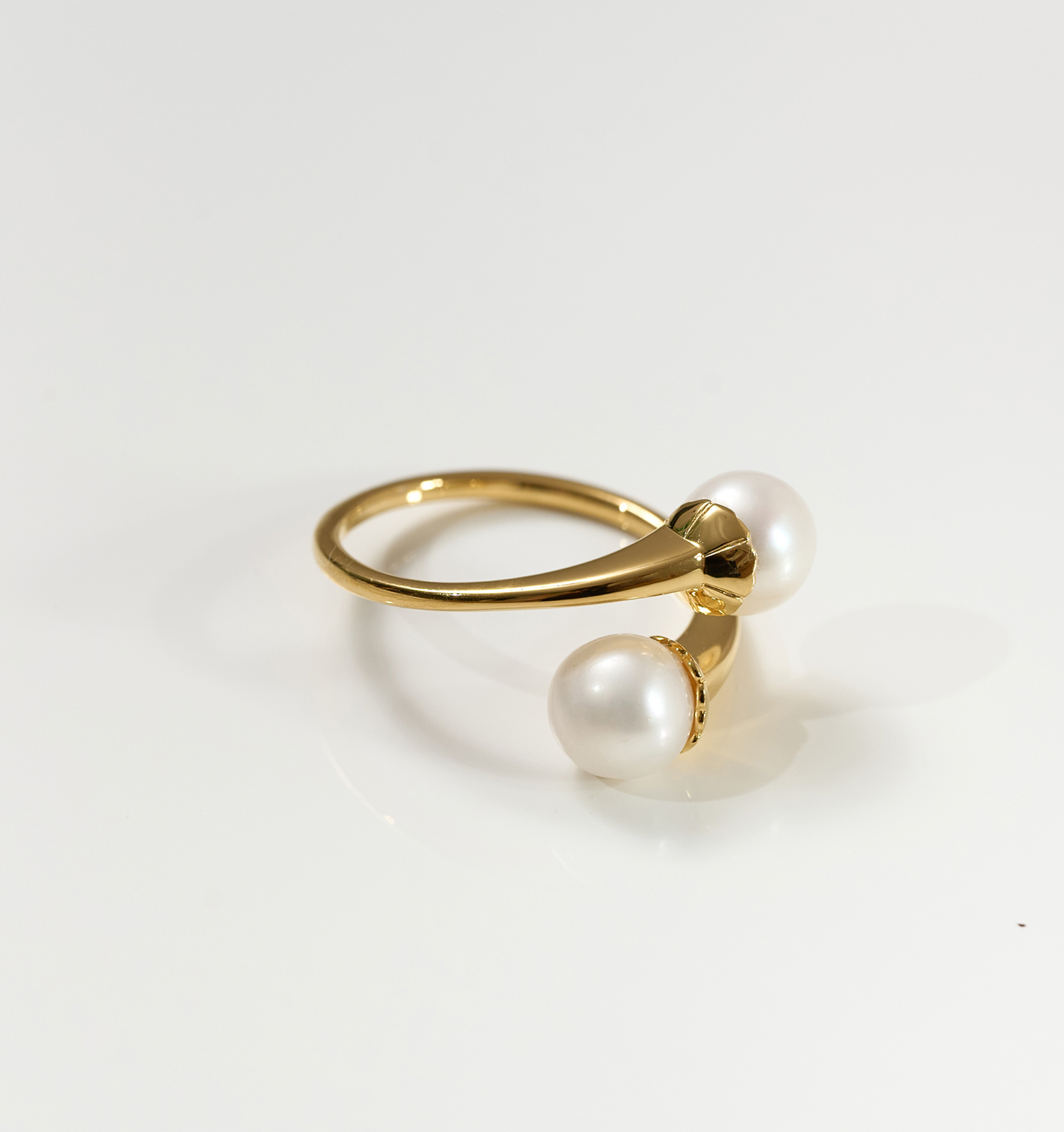 YugYagn Ring with two pearls and gold band symbolizing love and connection
