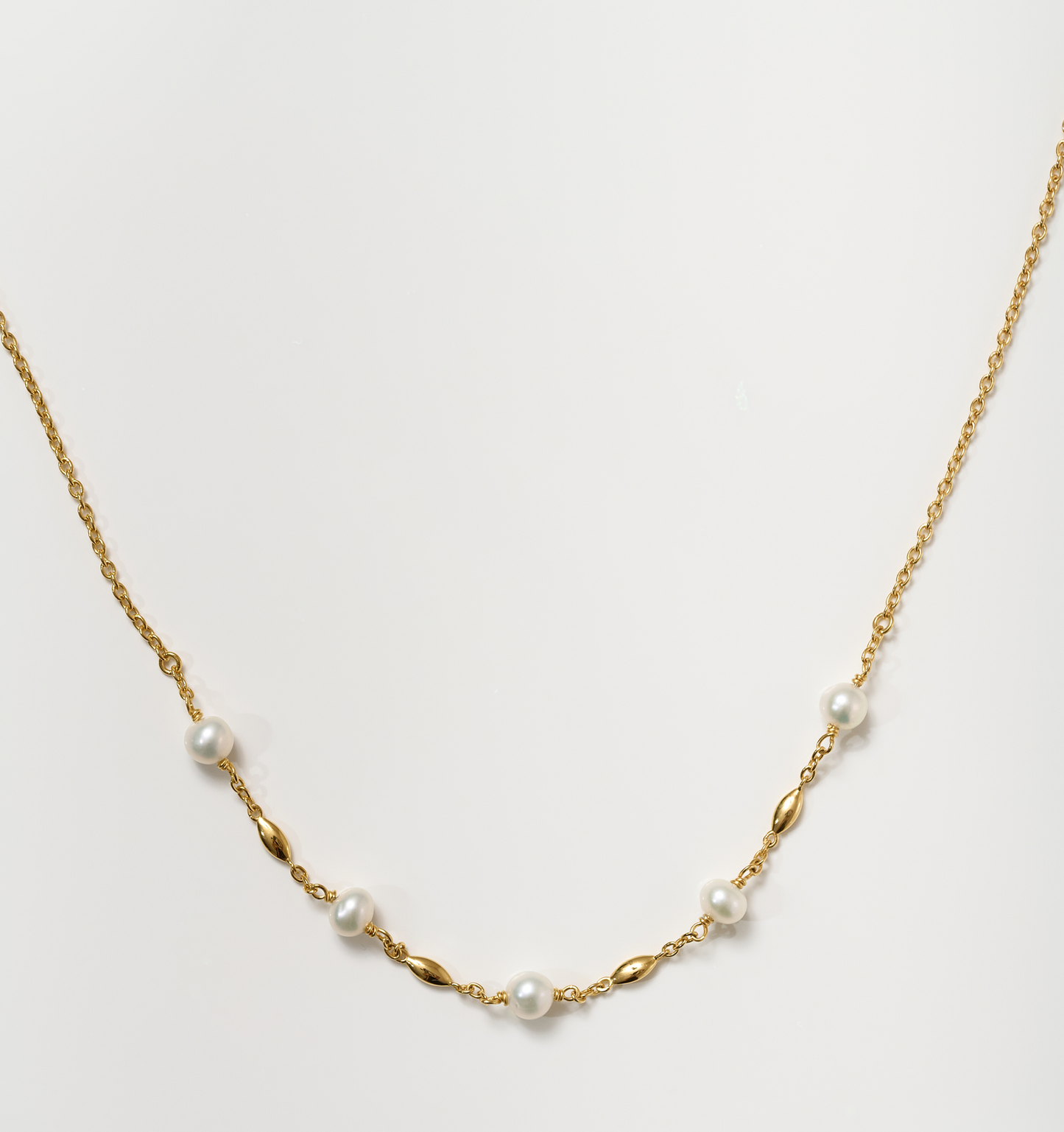 Manjari Necklace with five pearls and gold beads on a delicate gold chain