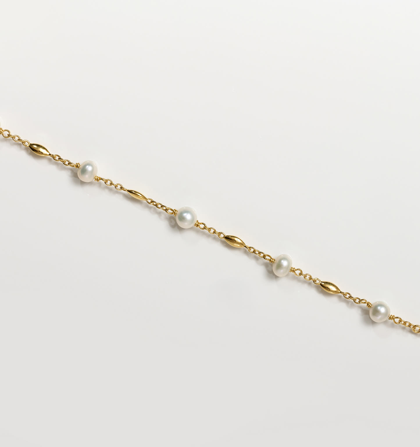 Manjari Necklace with five pearls and gold chain delicate design
