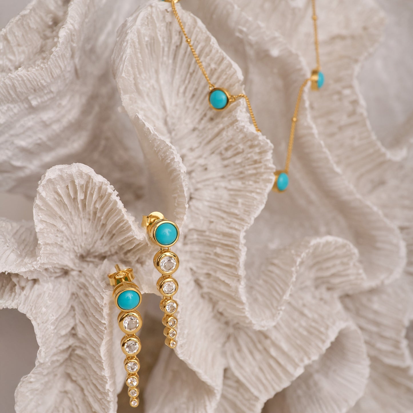 Vaani Necklace with turquoise stones and gold chain, symbolizing calm and throat chakra alignment