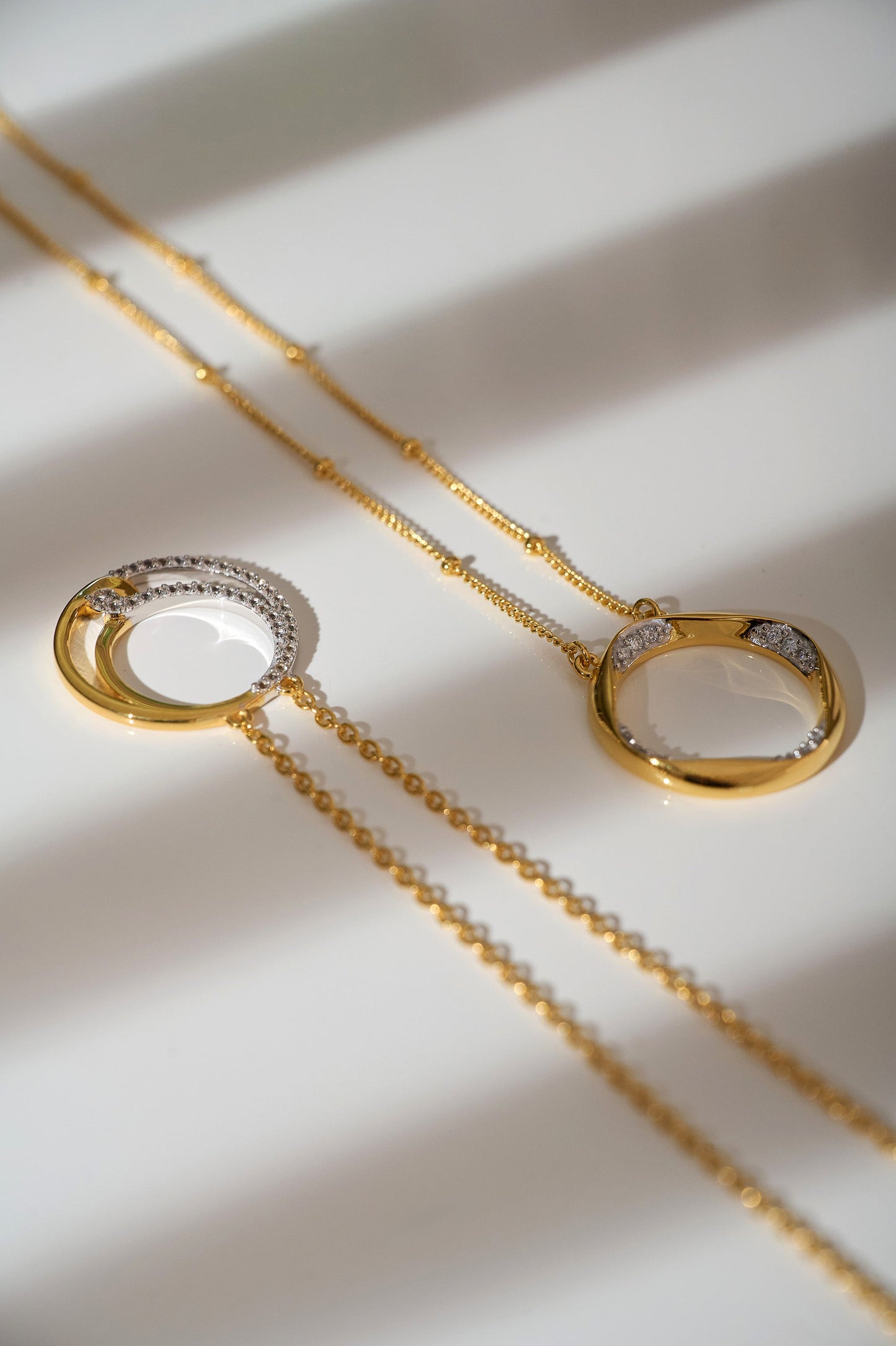 Elegant Nayra Necklace with gold and silver intertwined loops symbolizing union and strength