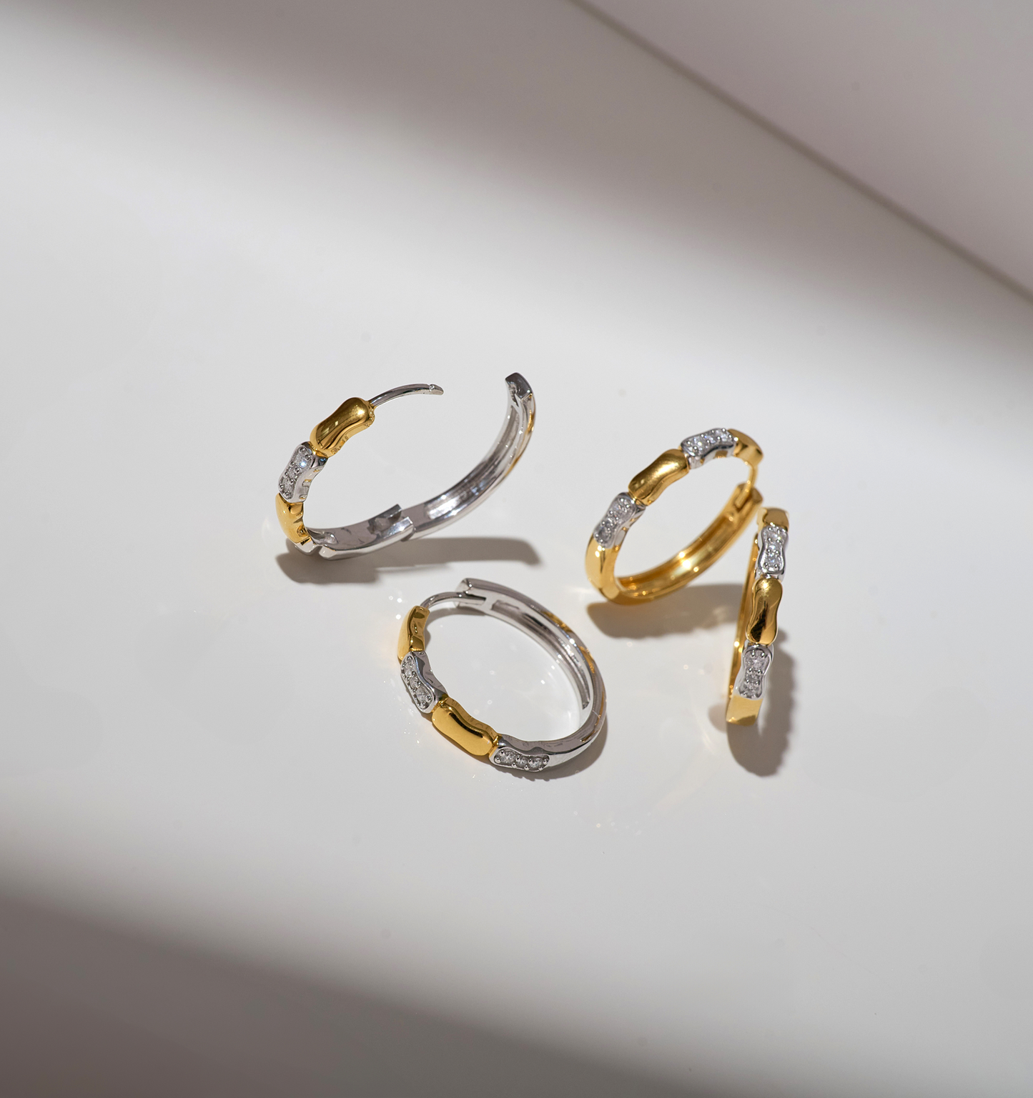 Orita Earrings gold and silver hoops with sparkling stones elegant jewelry