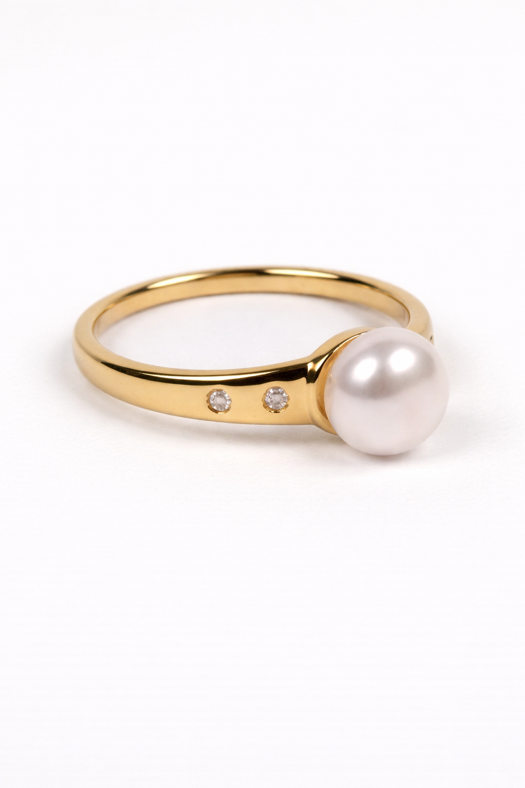 Deepa Ring with central pearl surrounded by lab-grown diamonds radiating brilliance