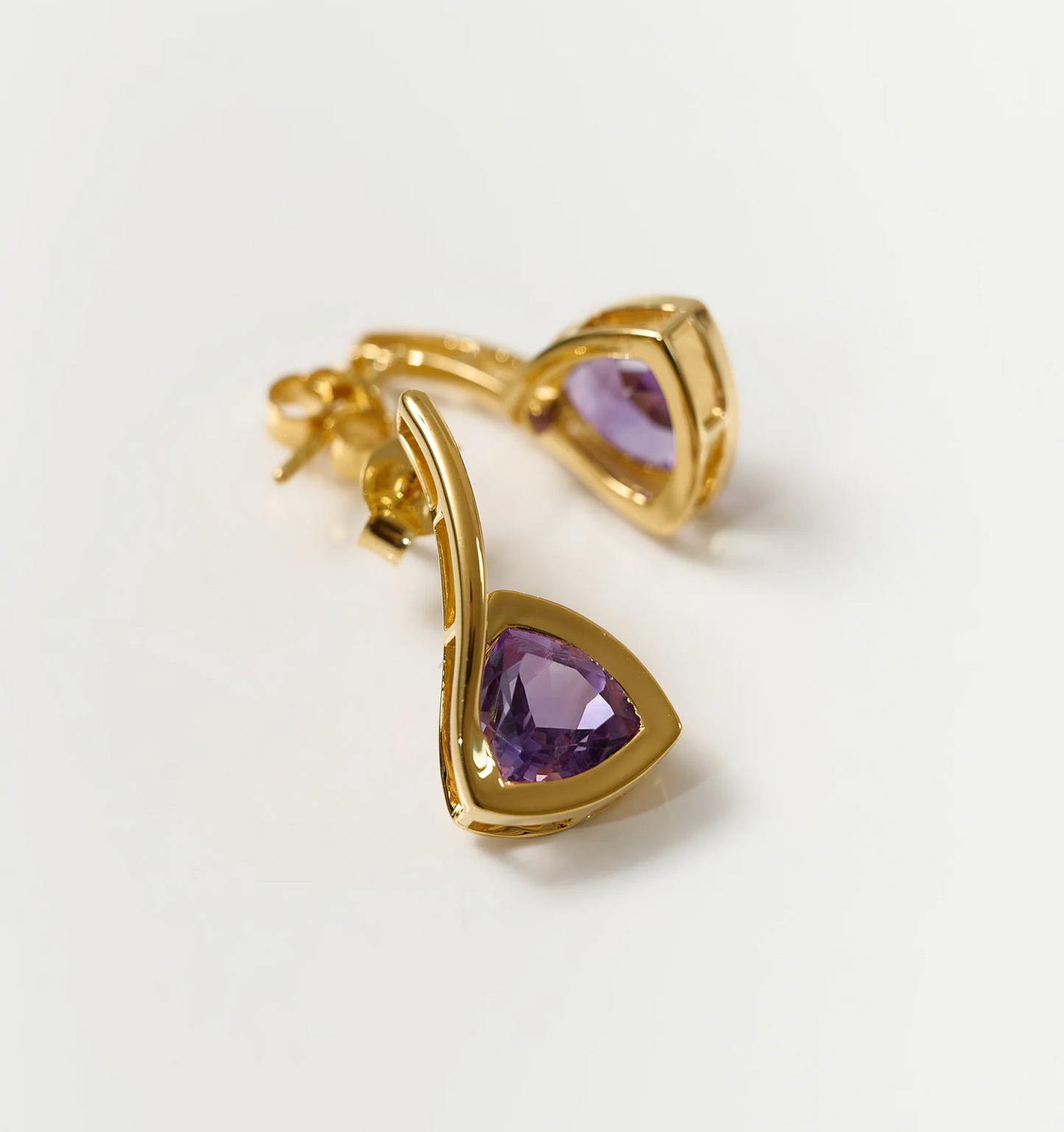 Samya Earrings with gold setting and purple amethyst stones, elegant and balanced design