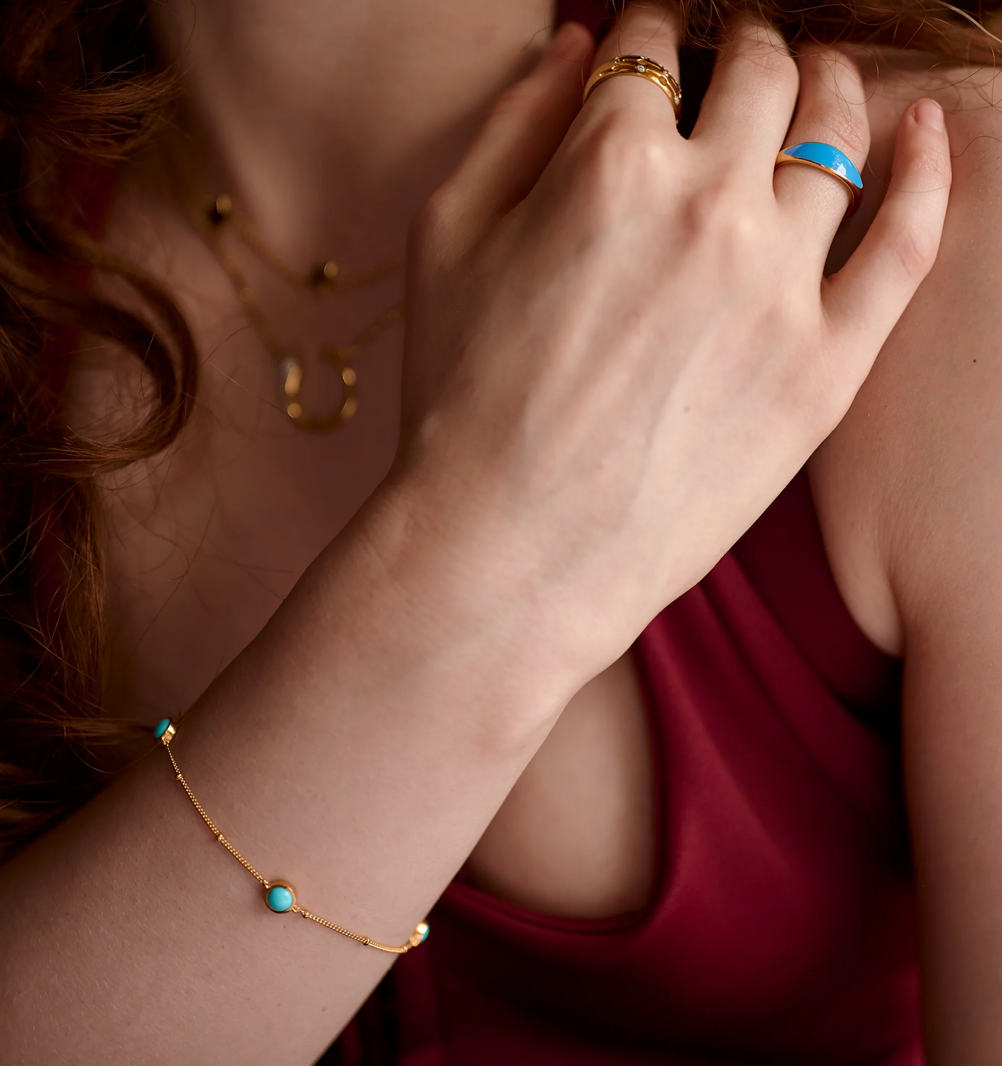 Nilaaya Bracelet with Sleeping Beauty turquoise on gold chain worn on wrist