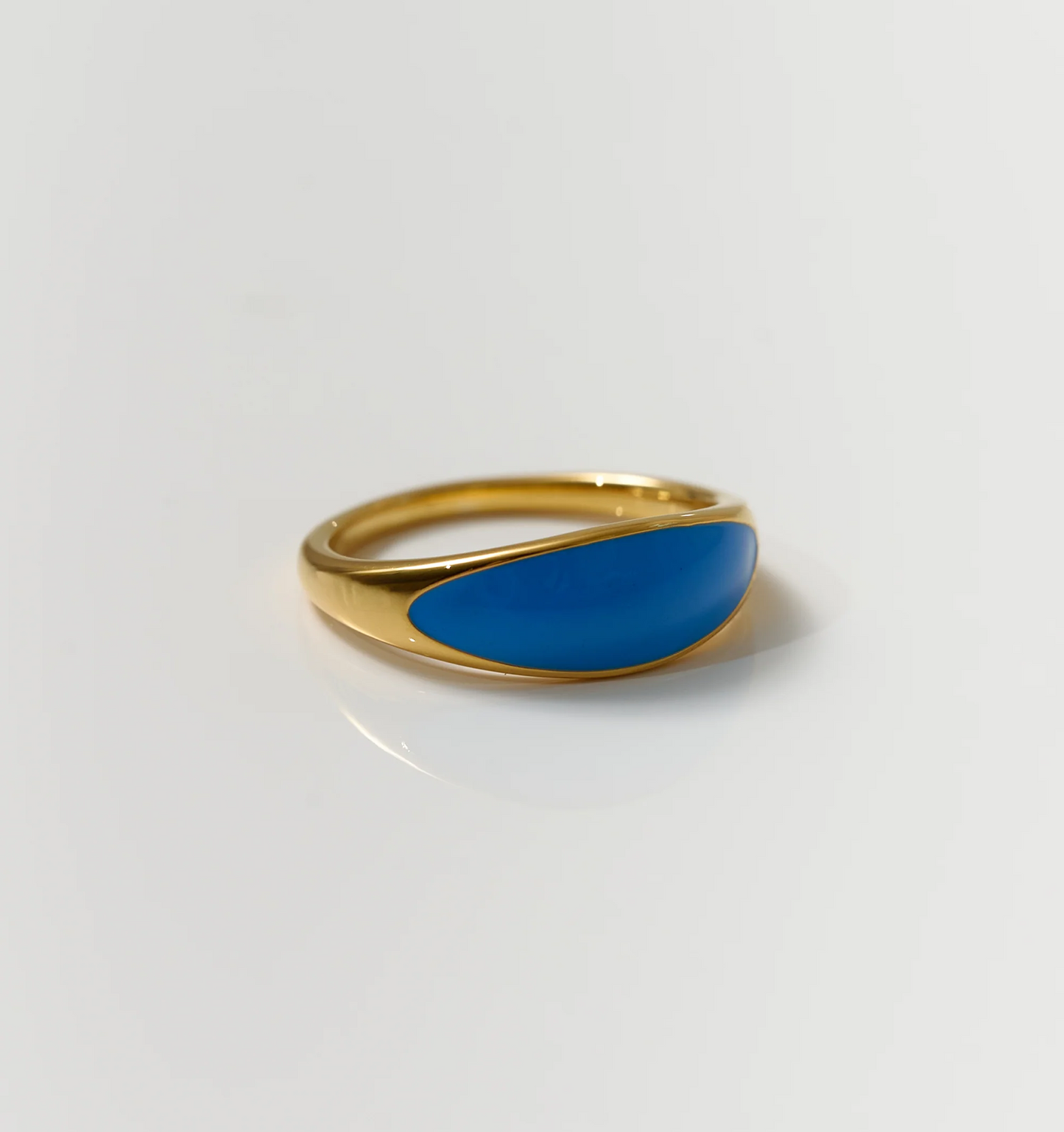 Neelra Ring gold band with smooth blue enamel inspired by water and tide motion