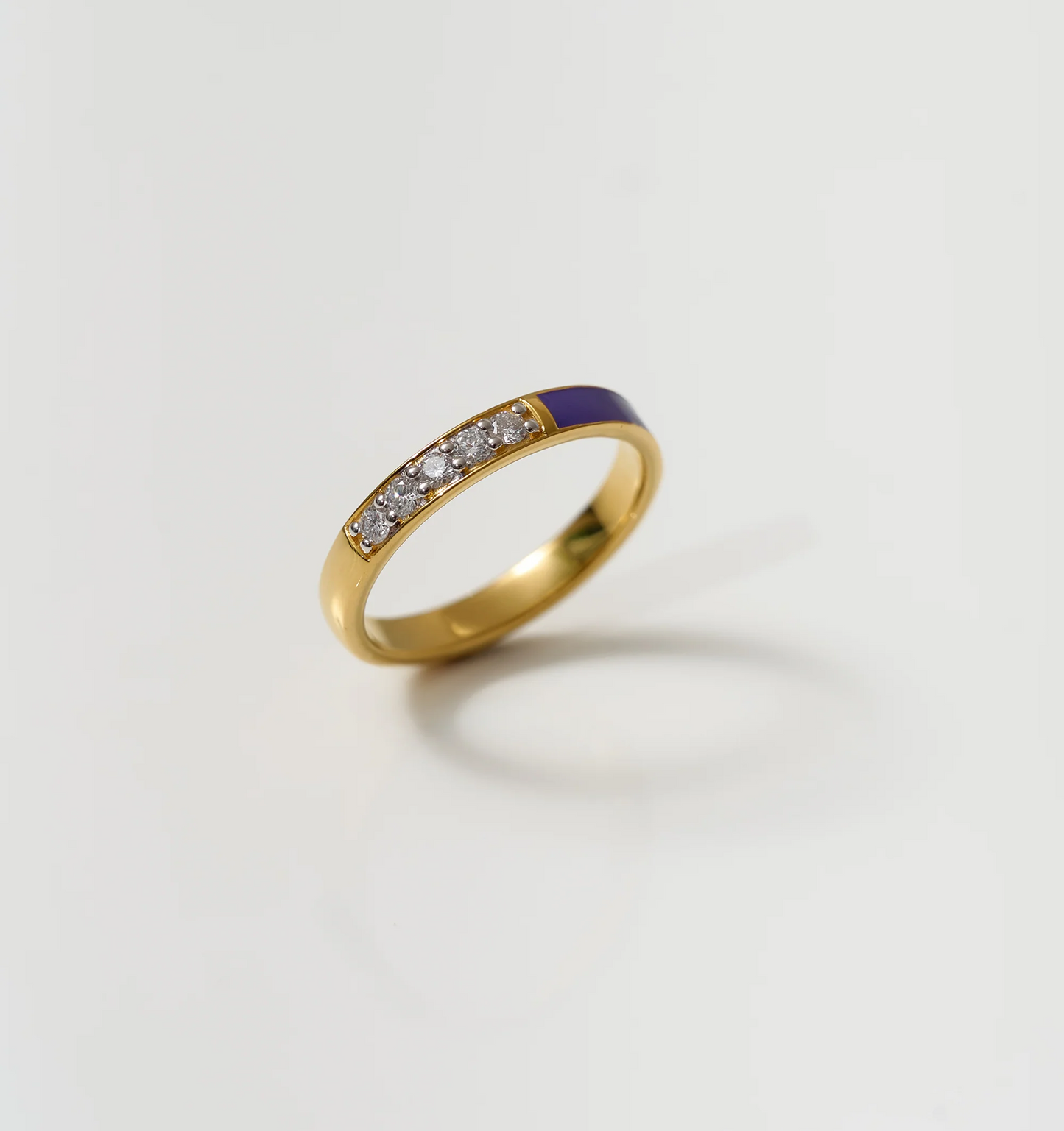 Pancha Ring gold band with purple arc and diamonds symbolizing balance and inner realm