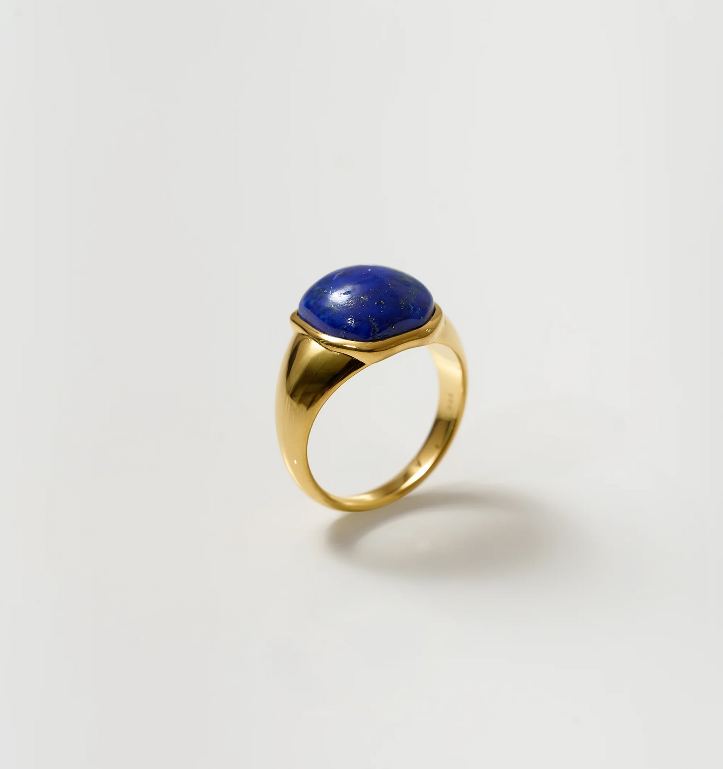 Neelaya Ring with bold blue lapis stone set in gold band symbolizing introspection and inner truth