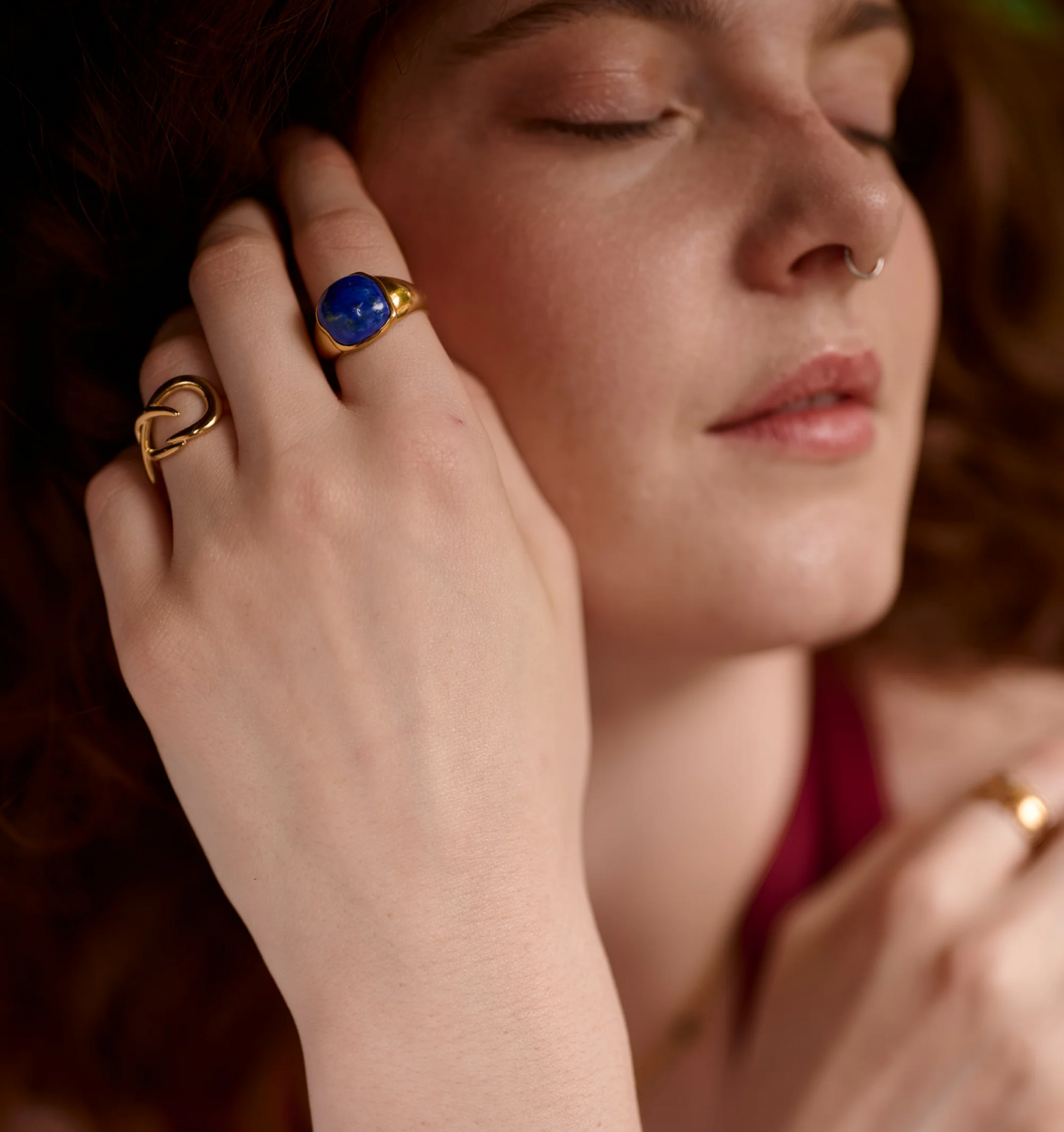 Neelaya Ring with bold lapis stone on woman's hand symbolizing introspection and inner knowing