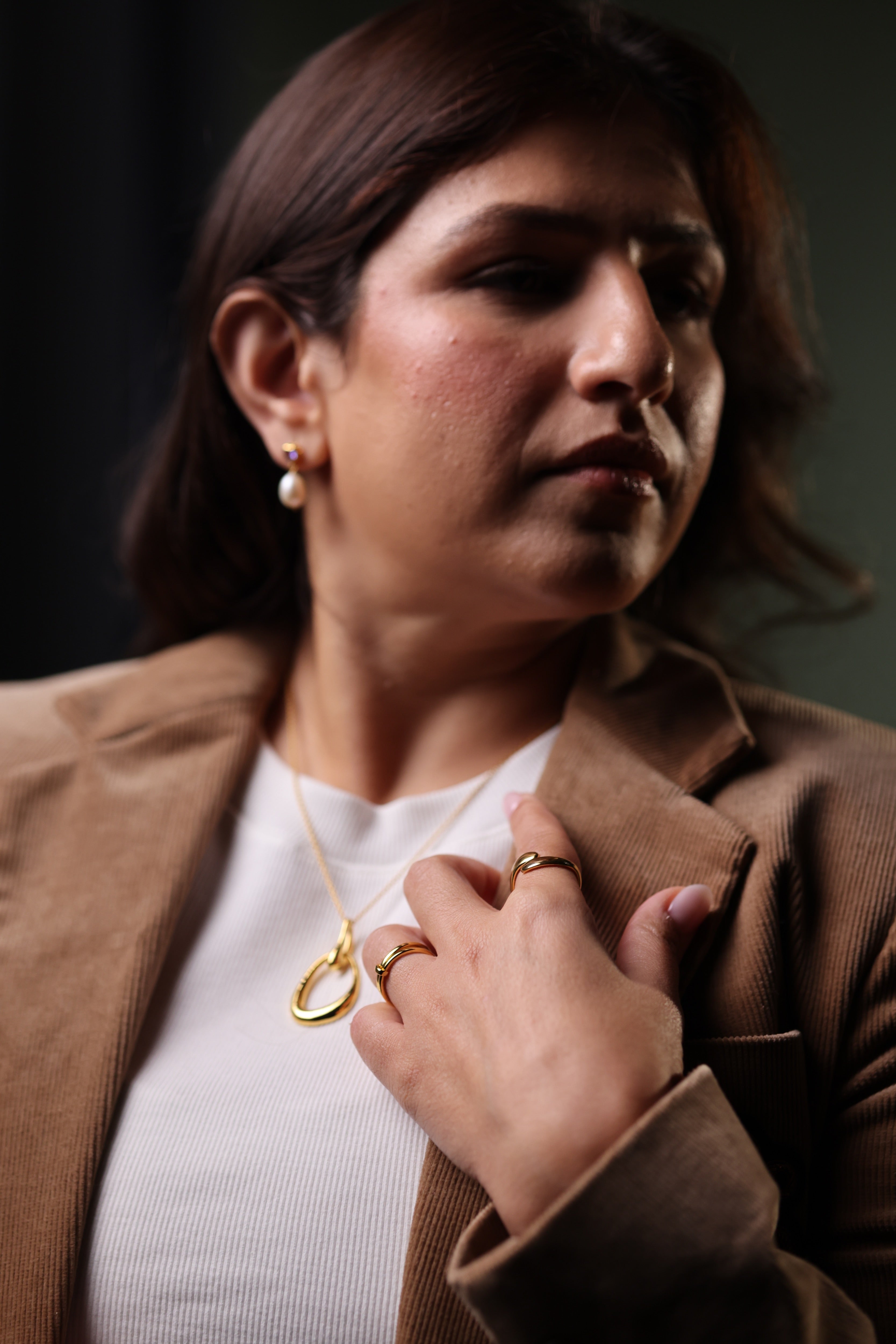 Yugal Ring featuring two sculptural rings connected by a single loop symbolizing unity and balance in modern design
