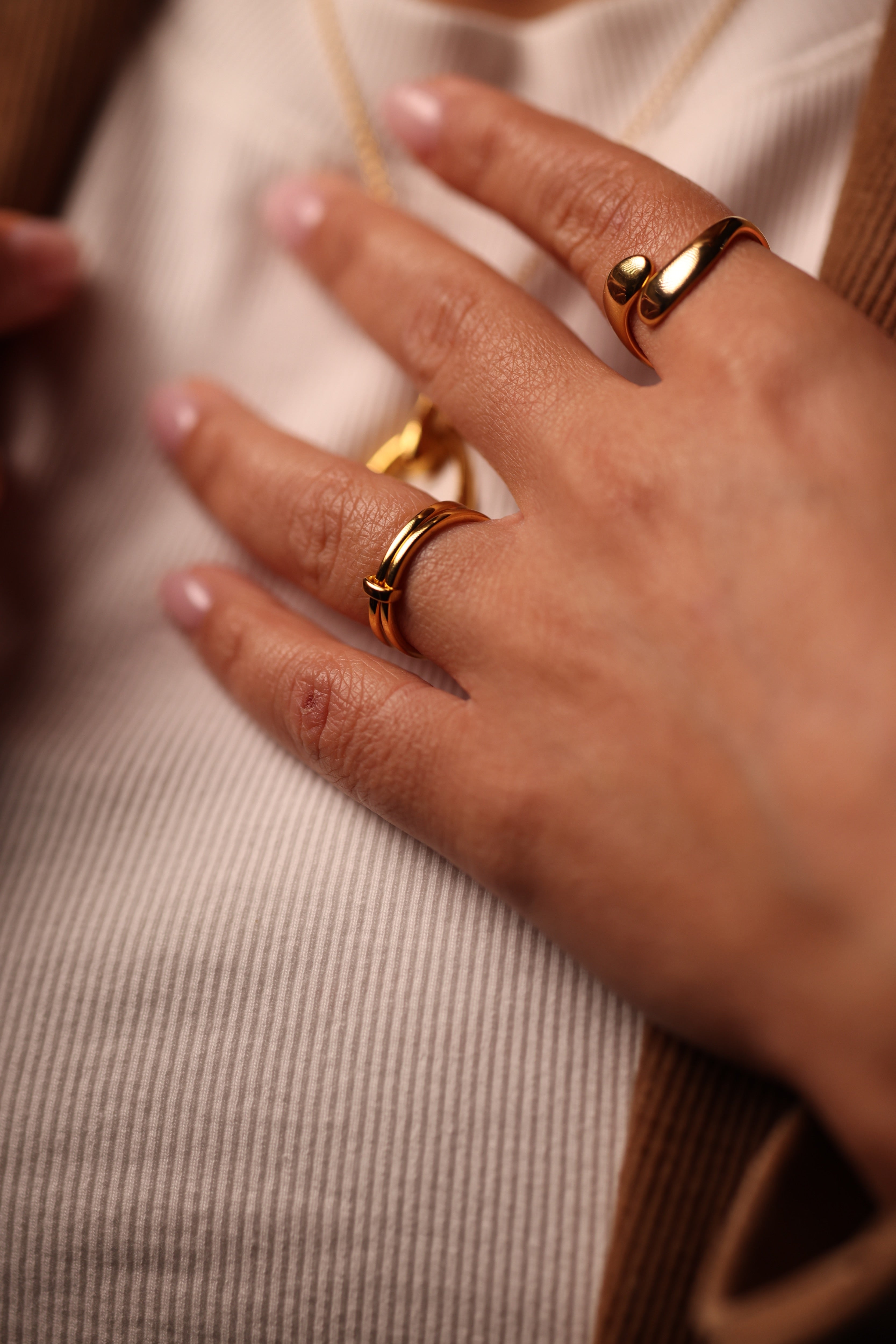 Yugal Ring with two sculptural interconnected rings symbolizing unity and balance