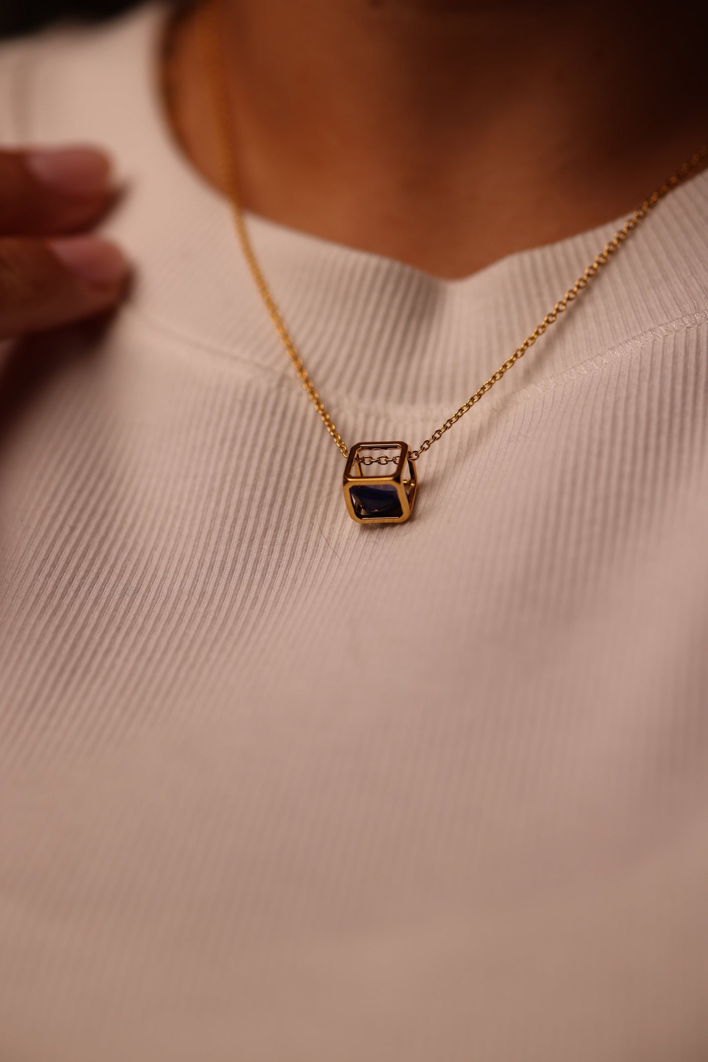 Kosha Necklace with round Lapis Lazuli stone in gold square frame, modern talisman design