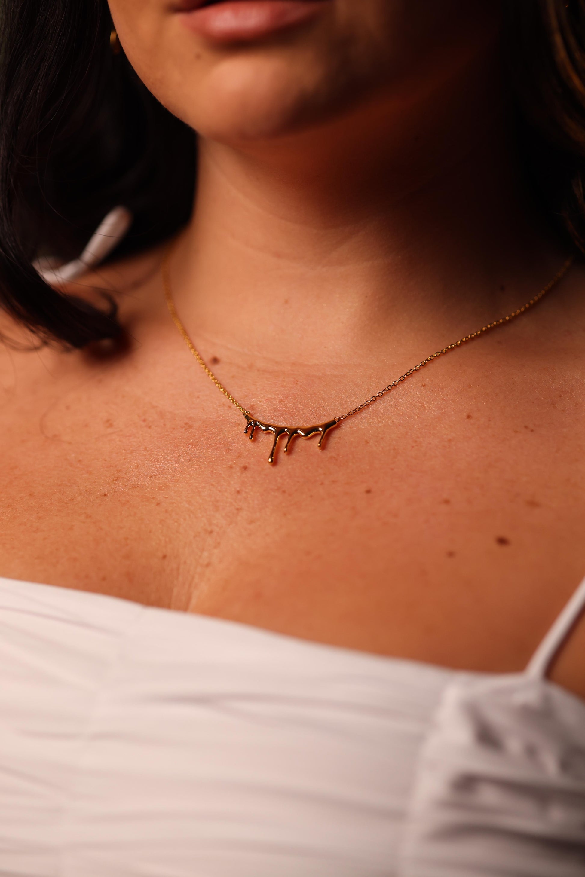 Jharna Necklace with curved neckline and cascading drops for graceful movement