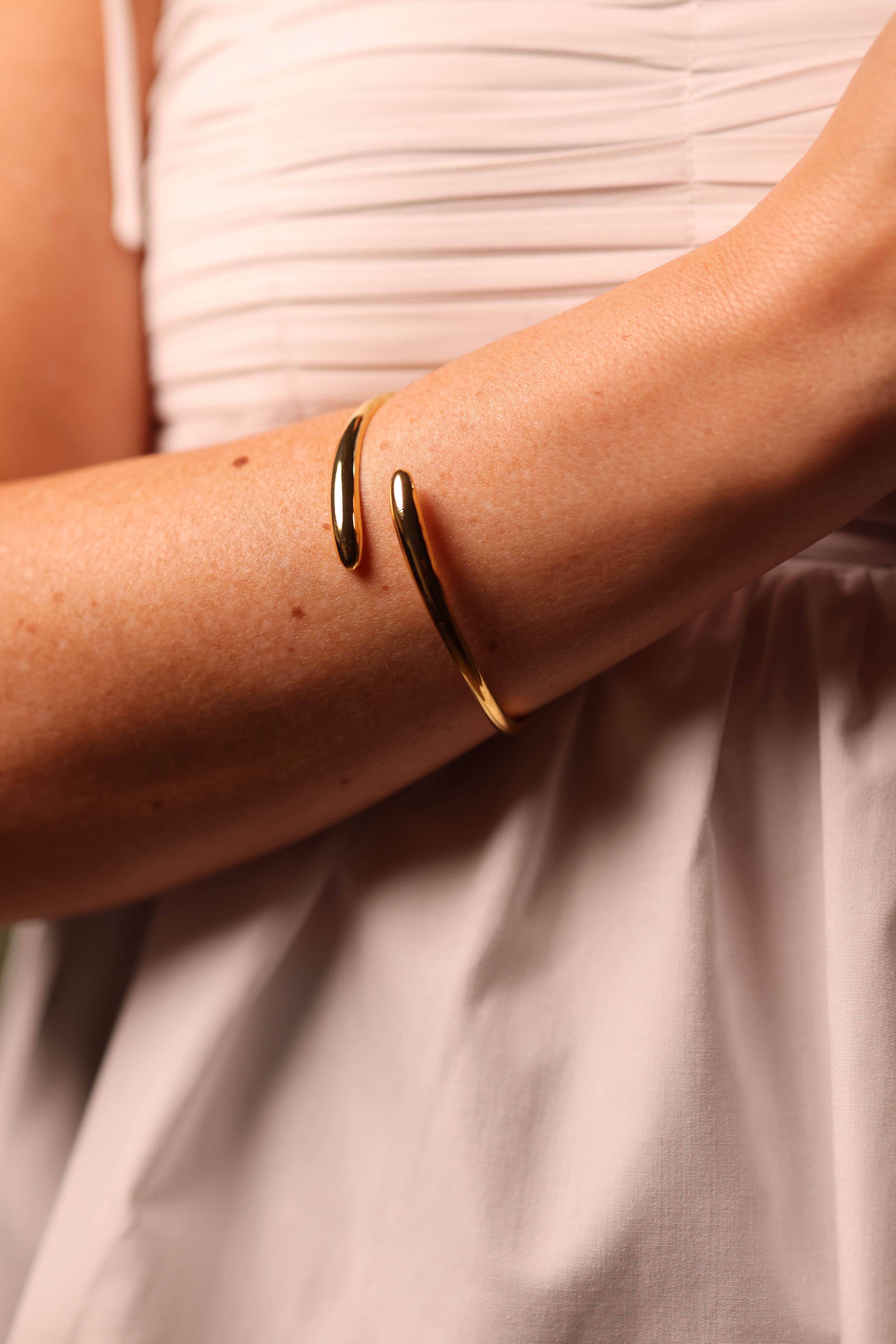 Avart Cuff sculptural spiral open-ended wrist bracelet with fluid curve and modern design