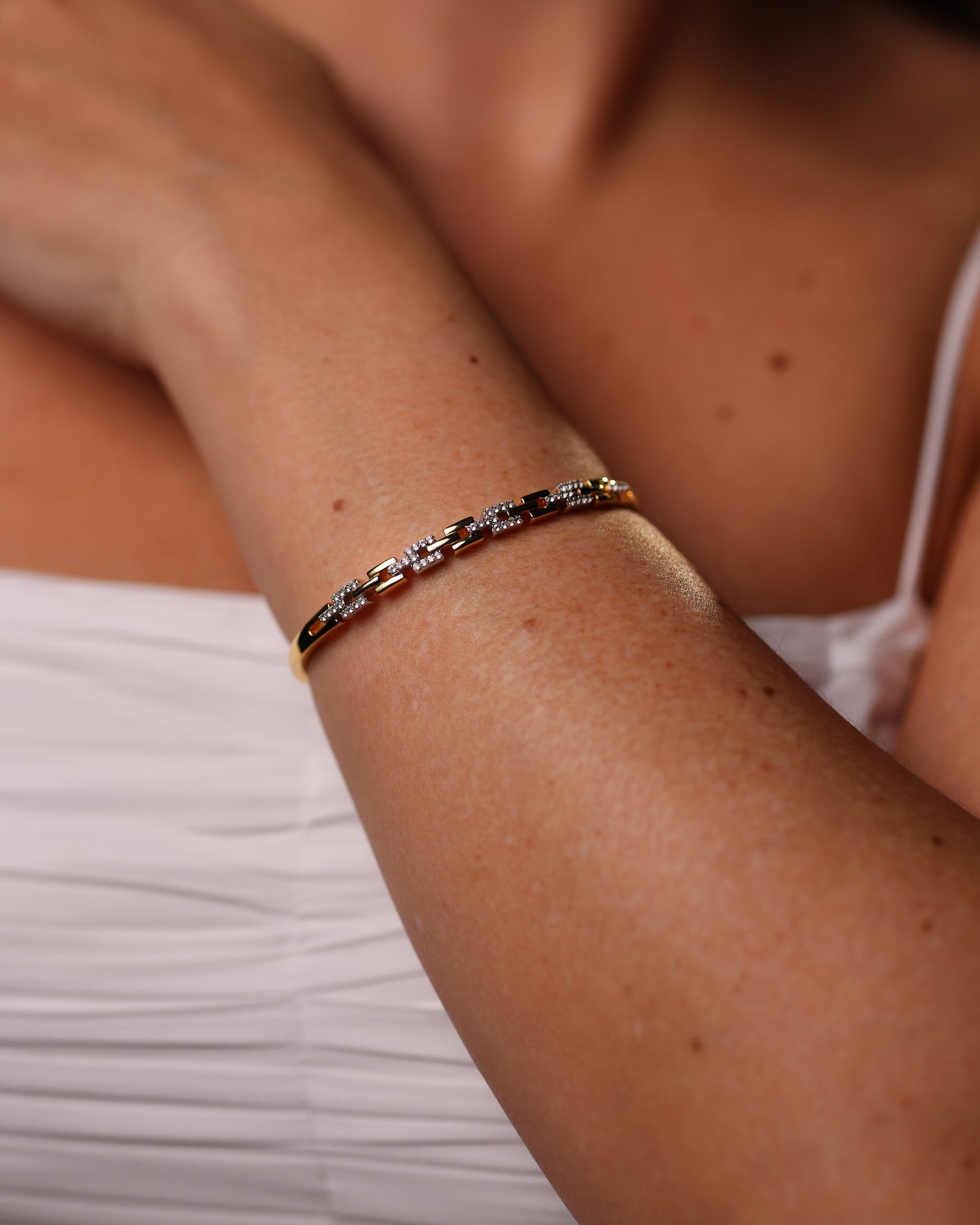 Two-tone Noura Cuff with 52 stones in gold and silver linked design