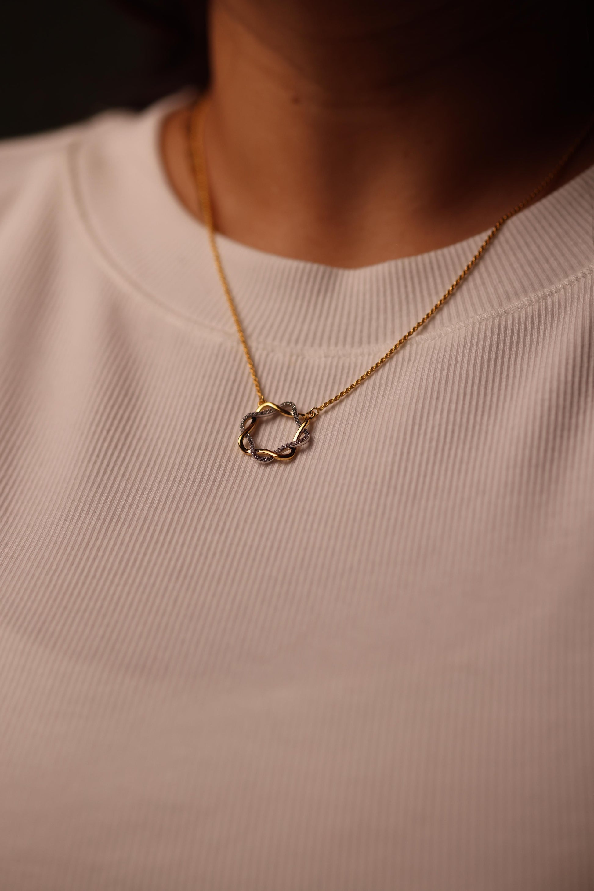 Mandala Necklace with white topaz stones in a modern circular design symbolizing clarity and harmony