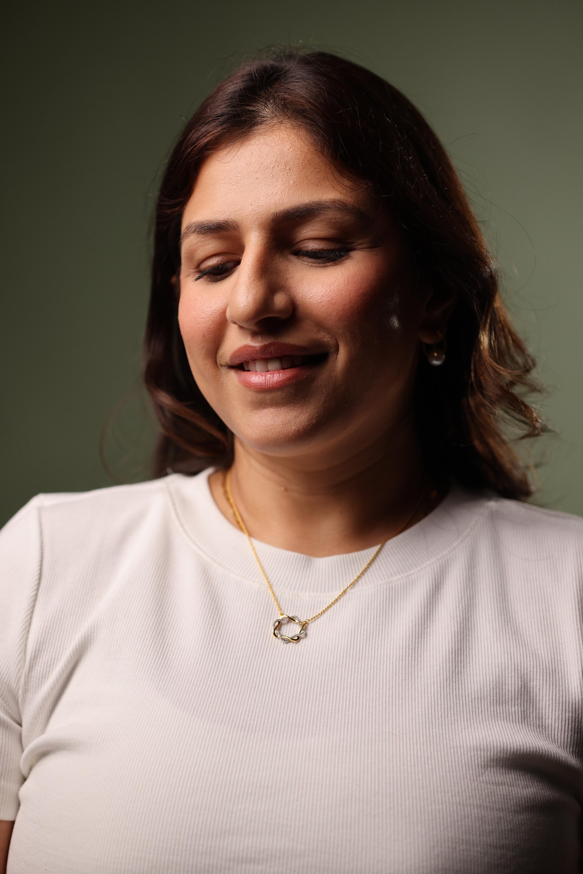 Mandala Necklace with white topaz stones in a circular, modern geometric design symbolizing balance and harmony