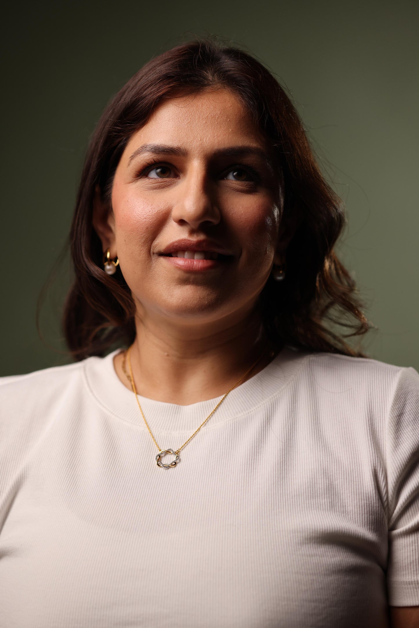 Mandala Necklace with white topaz stones in a modern circular design symbolizing balance and harmony