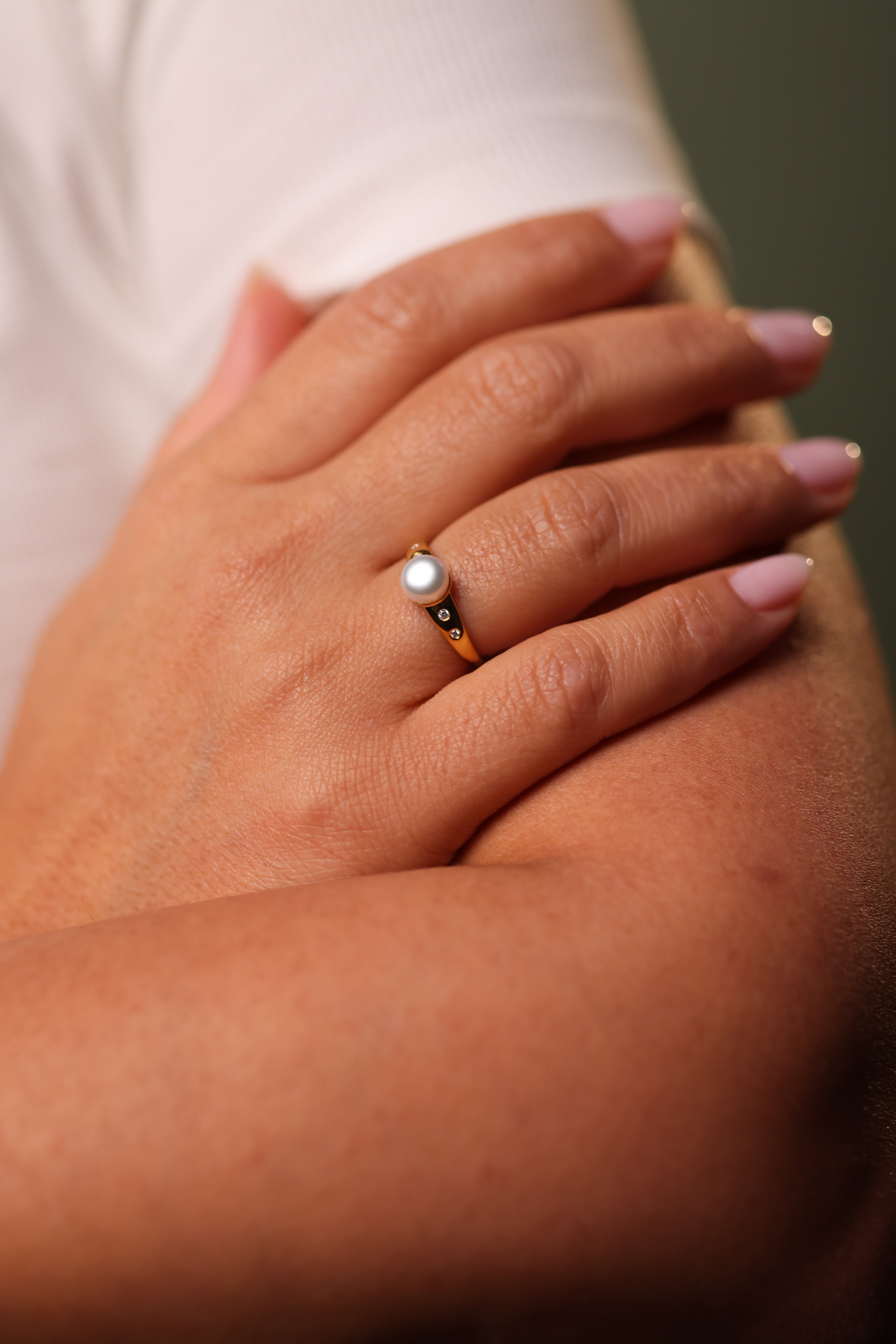 Deepa Ring with central luminous pearl surrounded by radiating lab-grown diamonds symbolizing balance and brilliance