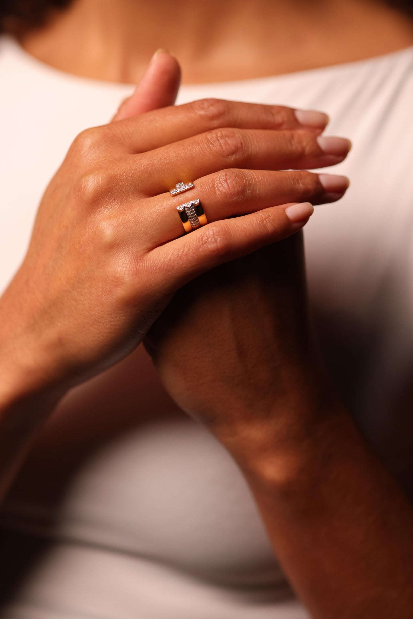 Kona Ring with white topaz on two-tone segmented band showcasing modern architectural design