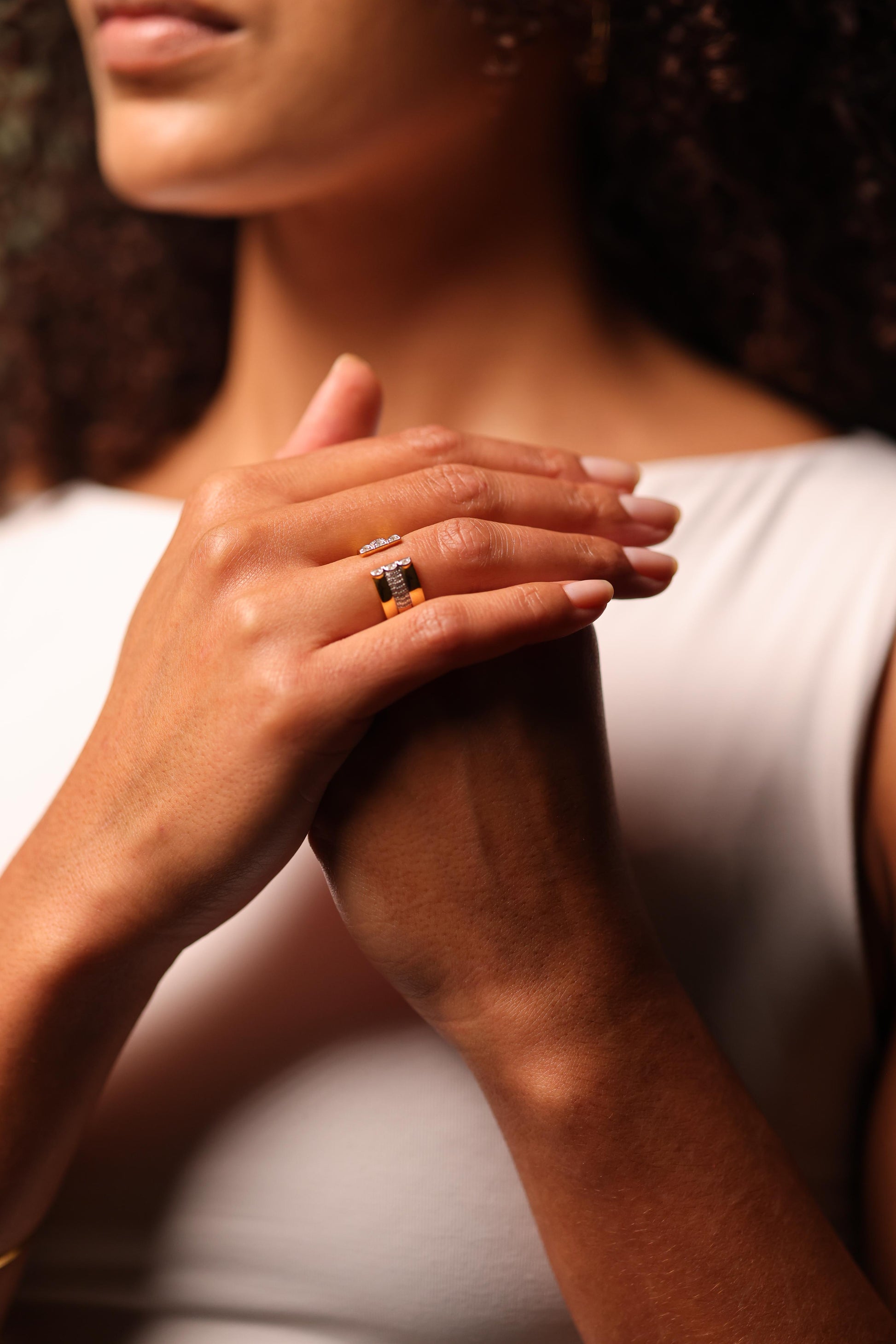 Kona Ring with white topaz on a two-tone segmented band showcasing modern architectural design