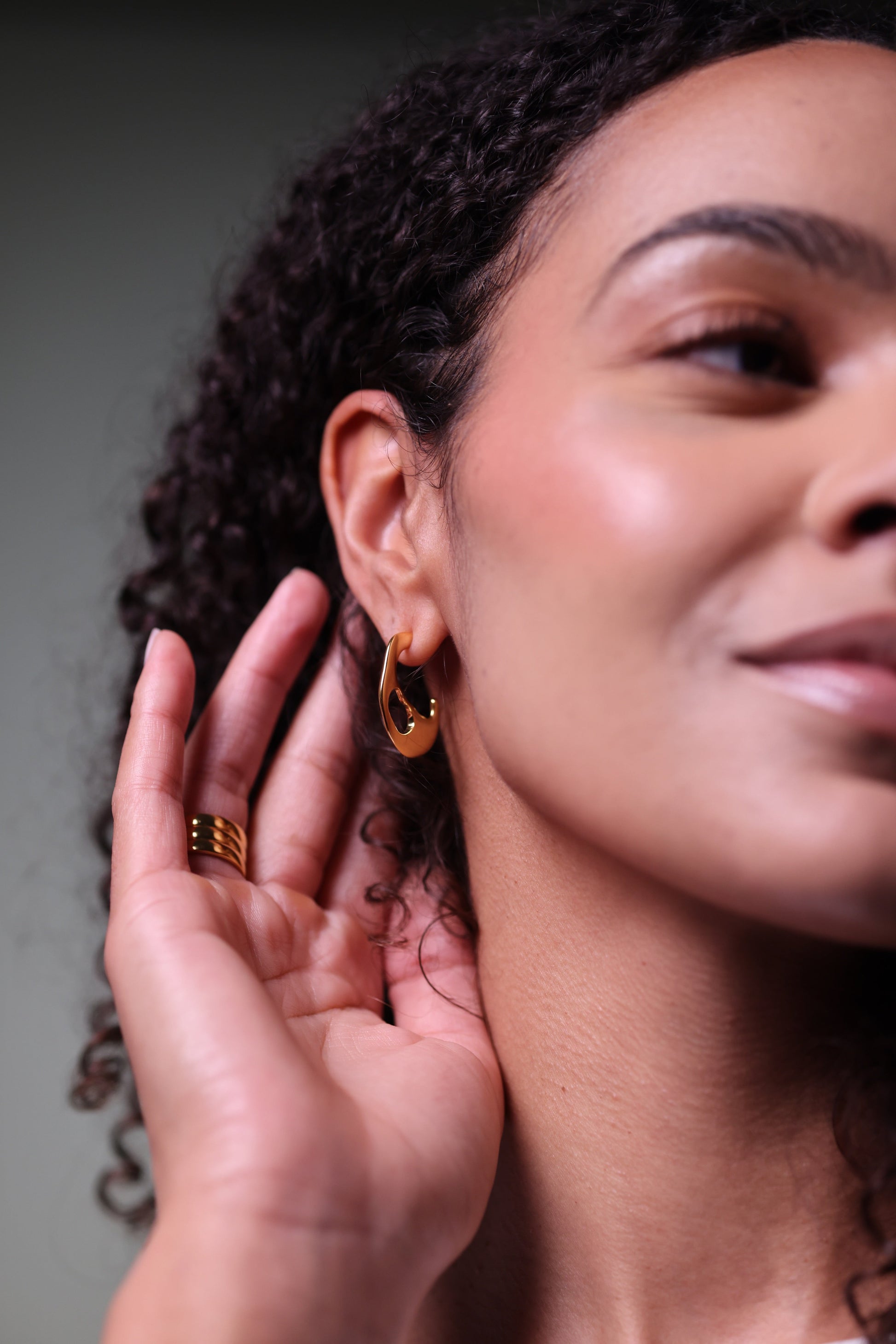 Kala Earring with crescent shape and smooth edges showcasing balanced, refined design