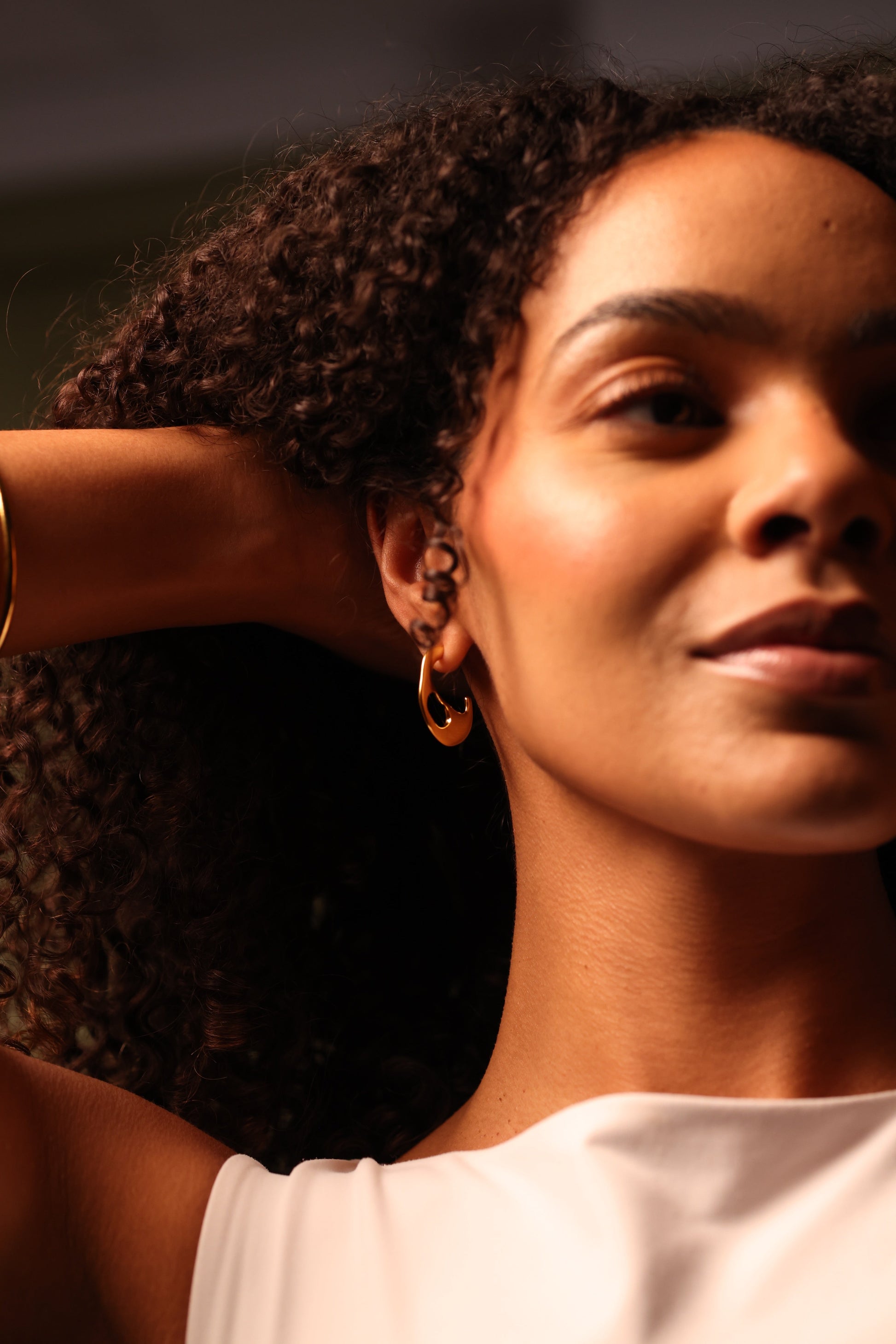 Kala Earring crescent-shaped with smooth edges and balanced design