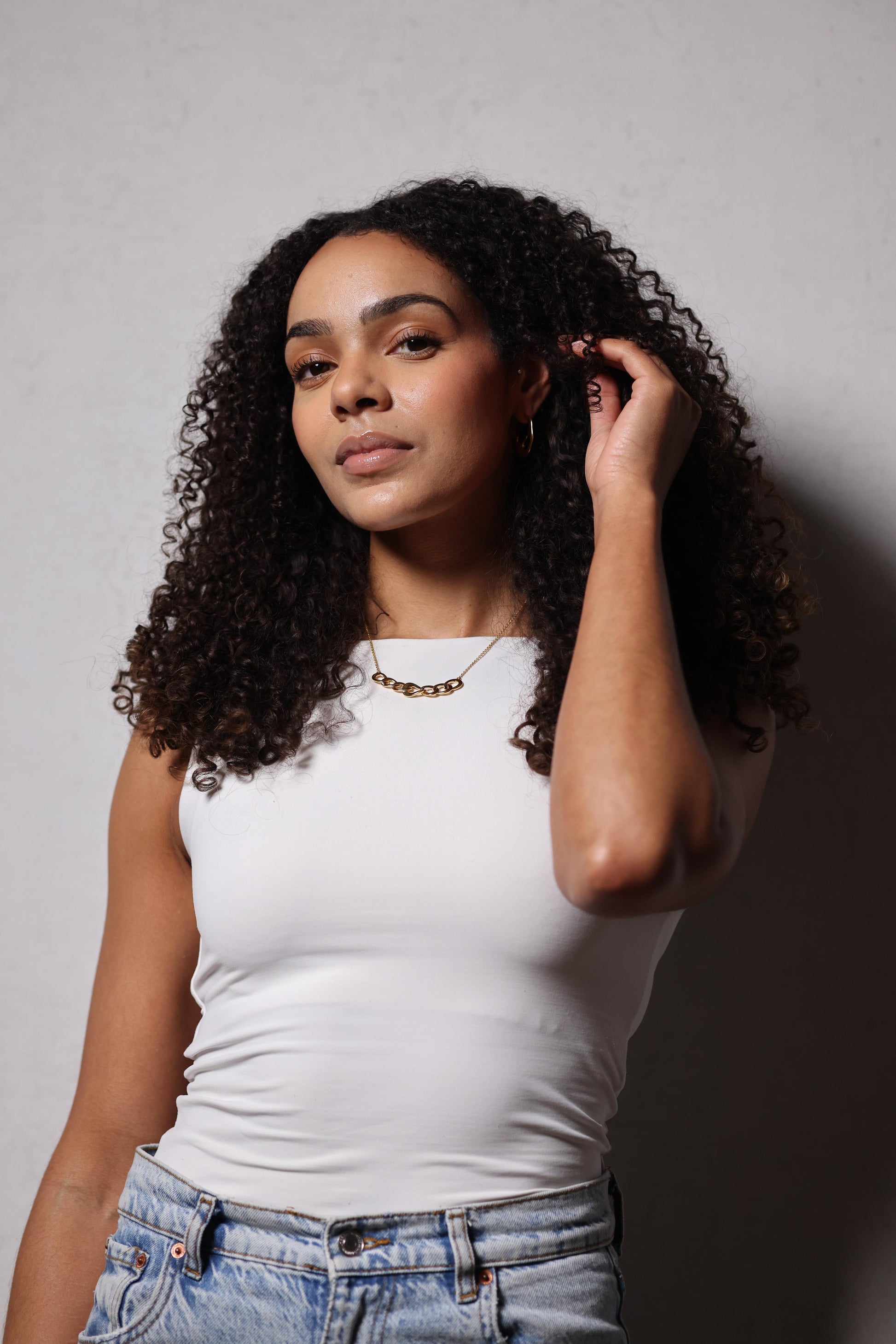 Gaath Necklace with softly linked forms resting naturally along the neckline for a refined and fluid design