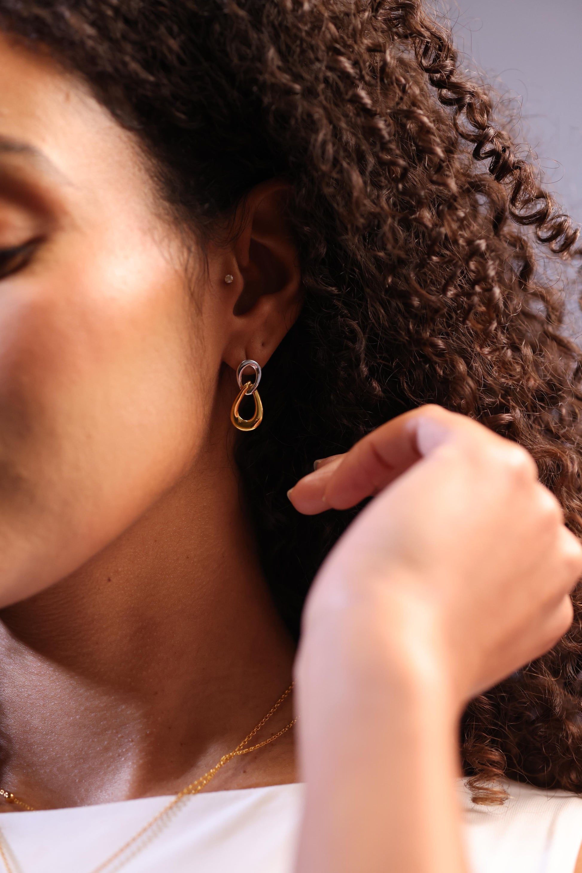 Sama Earring with two interlinked contrasting forms symbolizing balance and modern design