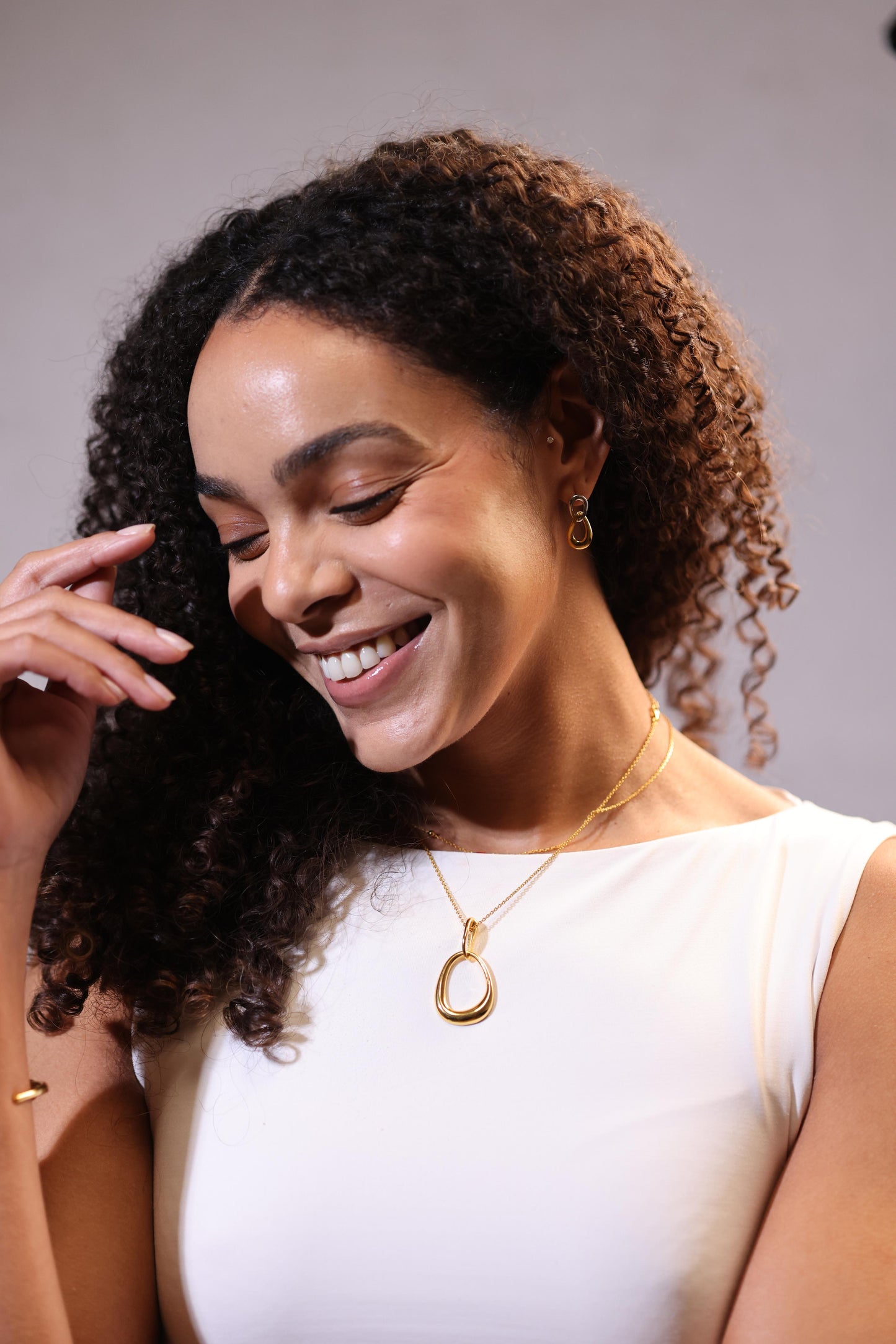 Sama Earring with two interlinked contrasting forms symbolizing balance and modern design